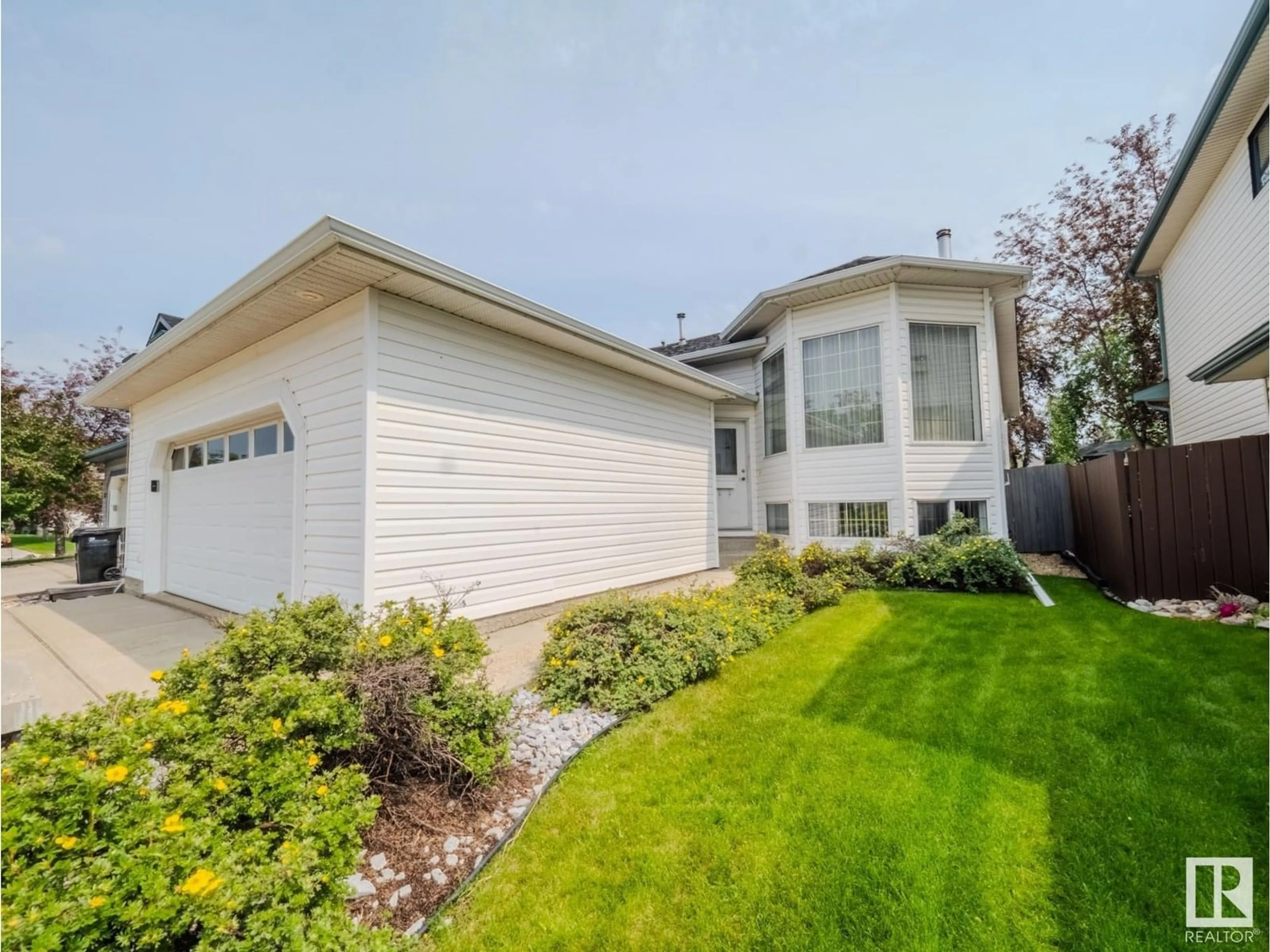 Home with vinyl exterior material, street for 125 FOXHAVEN PL, Sherwood Park Alberta T8A5Y4
