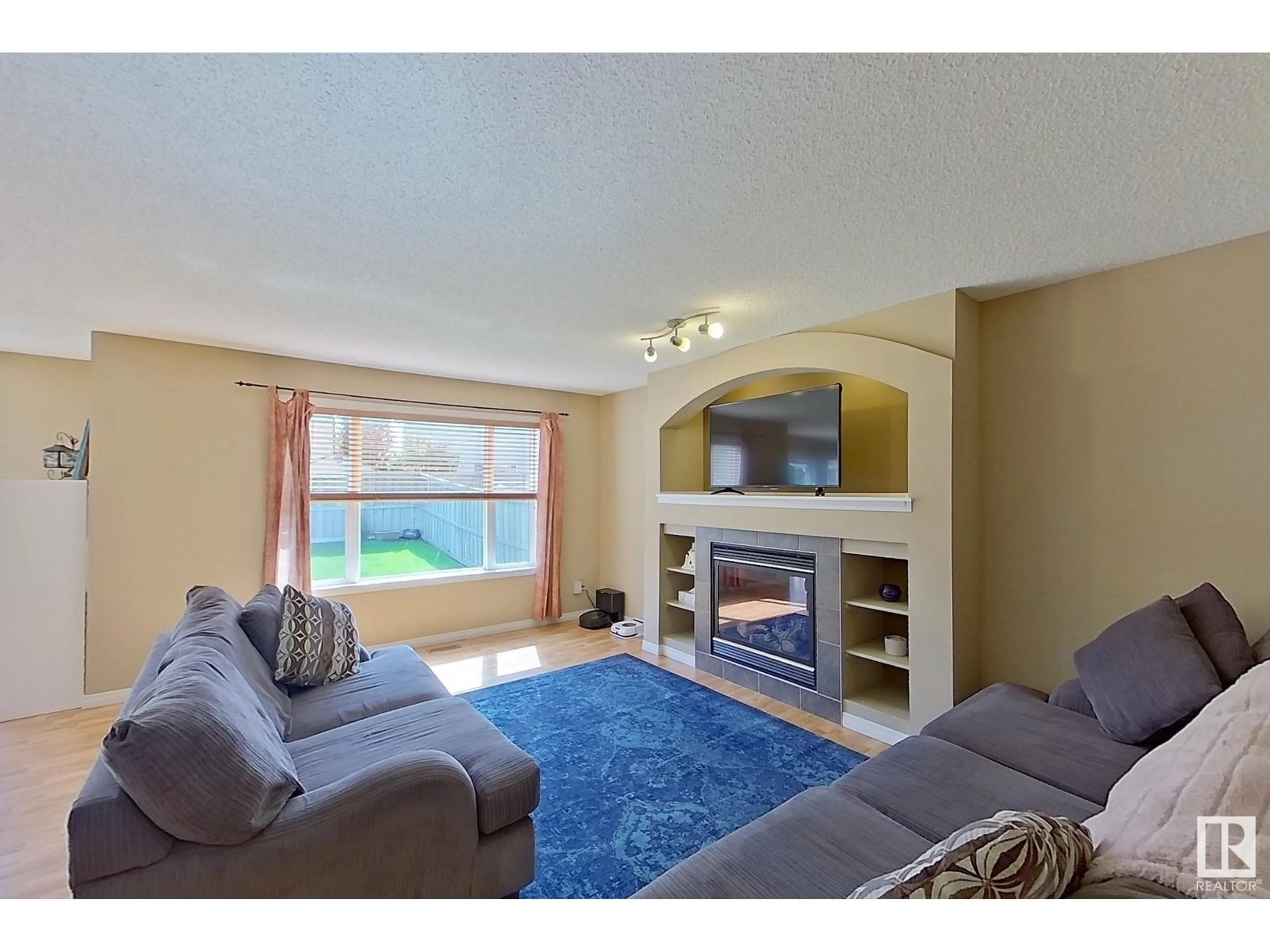 Living room with furniture, unknown for SW - 1141 MCALLISTER CO, Edmonton Alberta T6W1T9