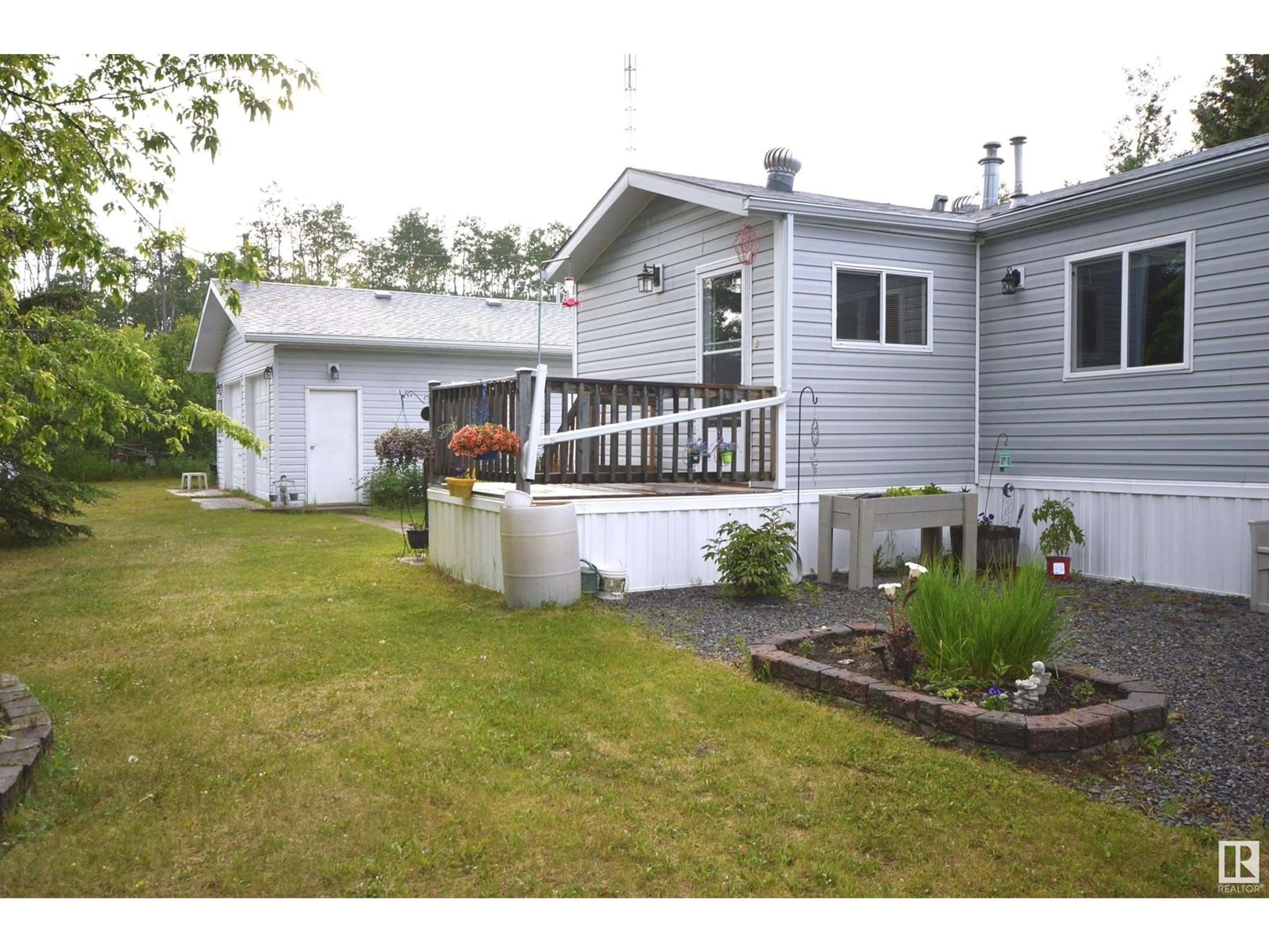 Home with vinyl exterior material, street for 65001 RGE RD 474, Rural Bonnyville M.D. Alberta T0A2A0