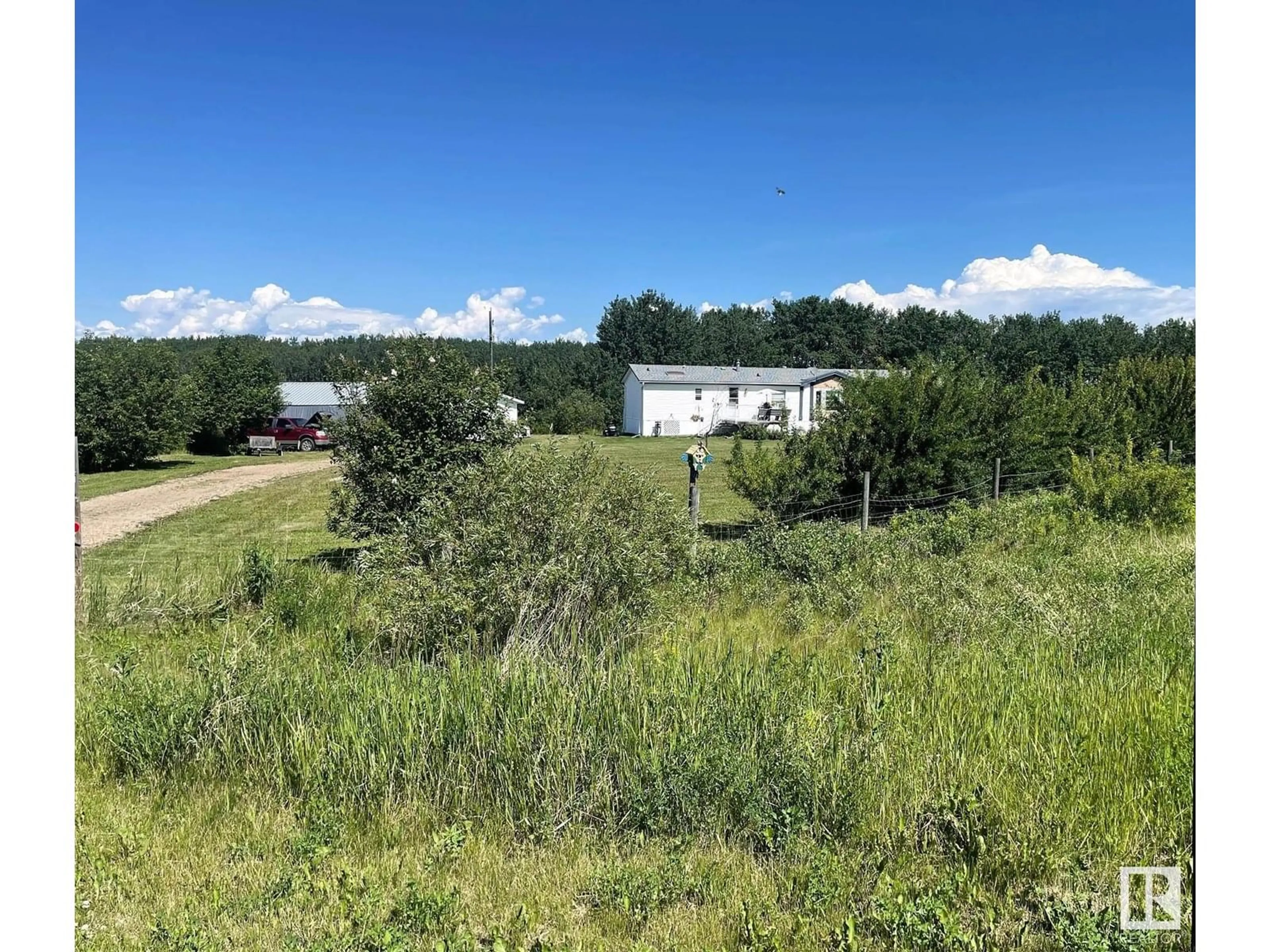 A pic from outside/outdoor area/front of a property/back of a property/a pic from drone, unknown for 62330 RGE RD 413, Rural Bonnyville M.D. Alberta T9M1P2