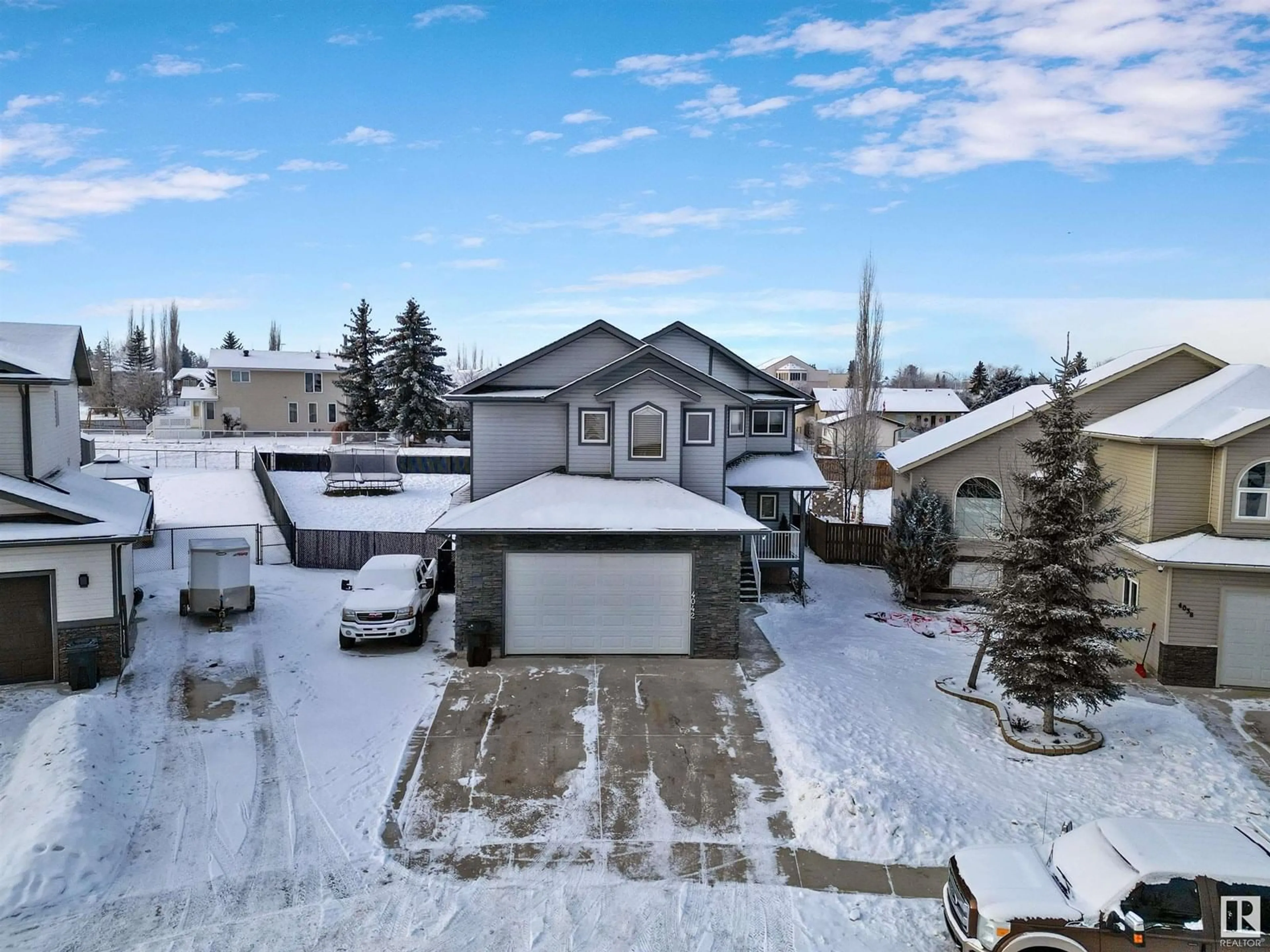 A pic from outside/outdoor area/front of a property/back of a property/a pic from drone, street for 4042 47 AVENUE, Drayton Valley Alberta T7A0A2