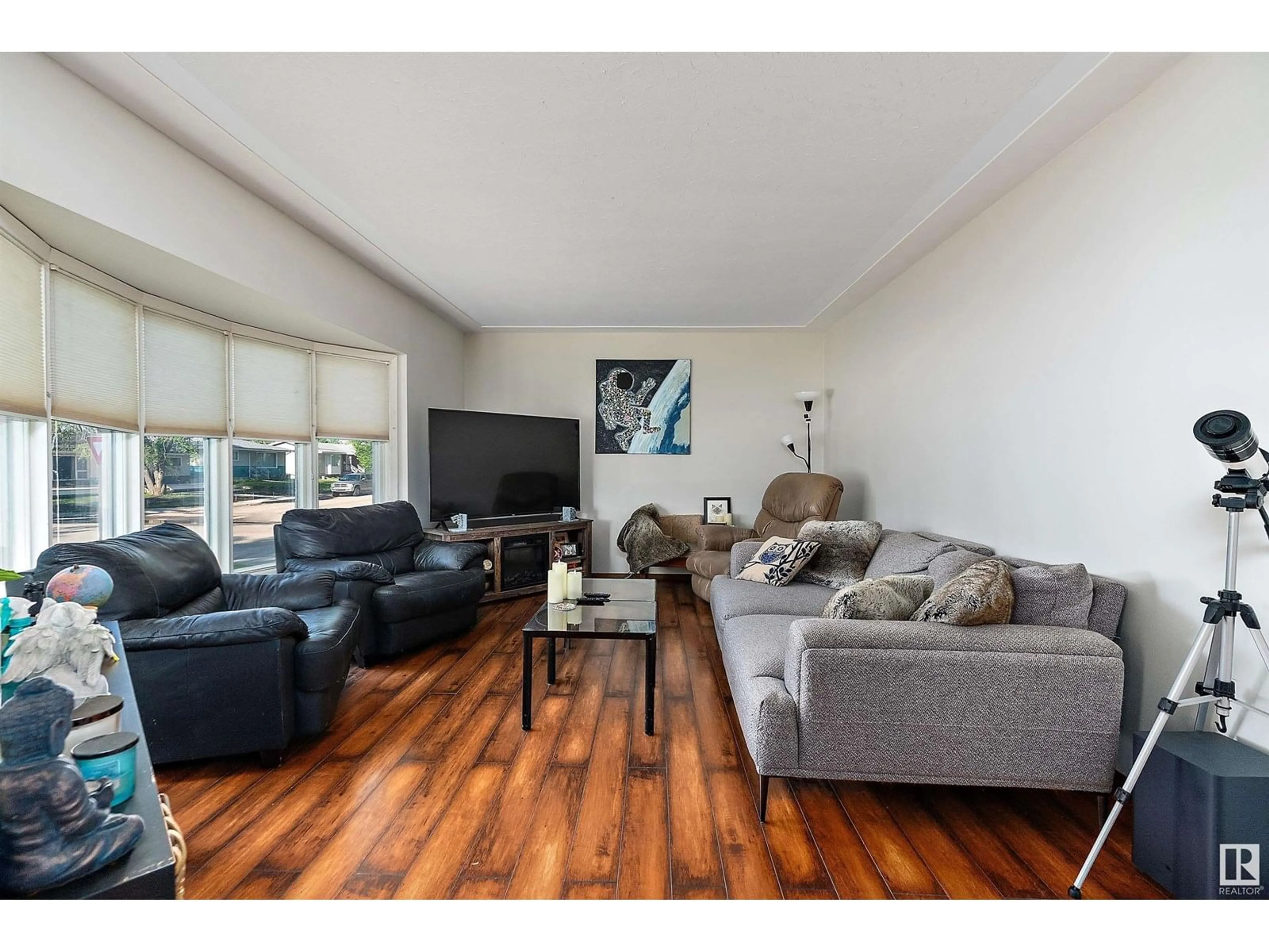 Living room with furniture, wood/laminate floor for 5120 47 AV, Leduc Alberta T9E5C5