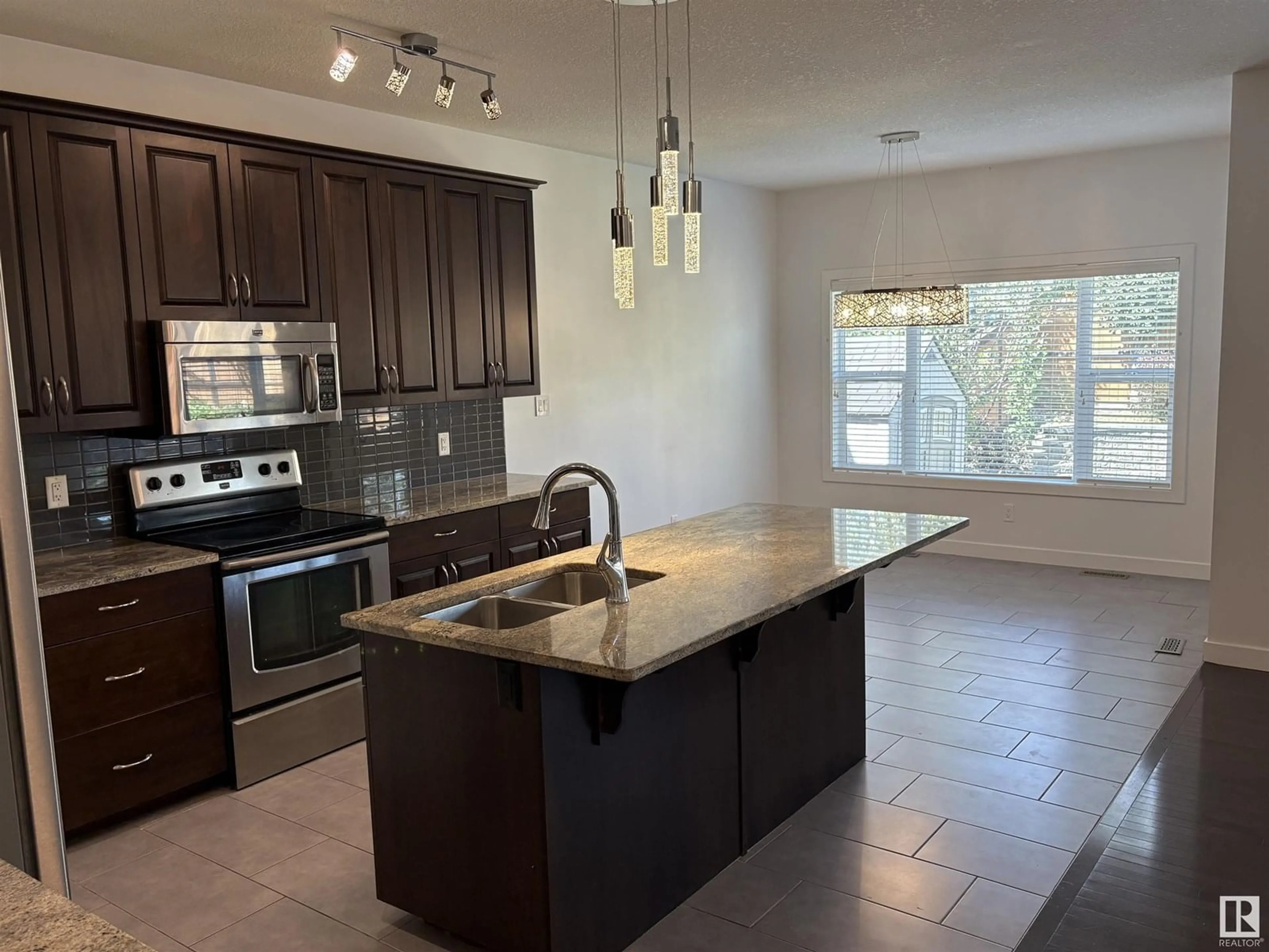 Open concept kitchen, ceramic/tile floor for 216 RIDGE DR, St. Albert Alberta T8N3K1