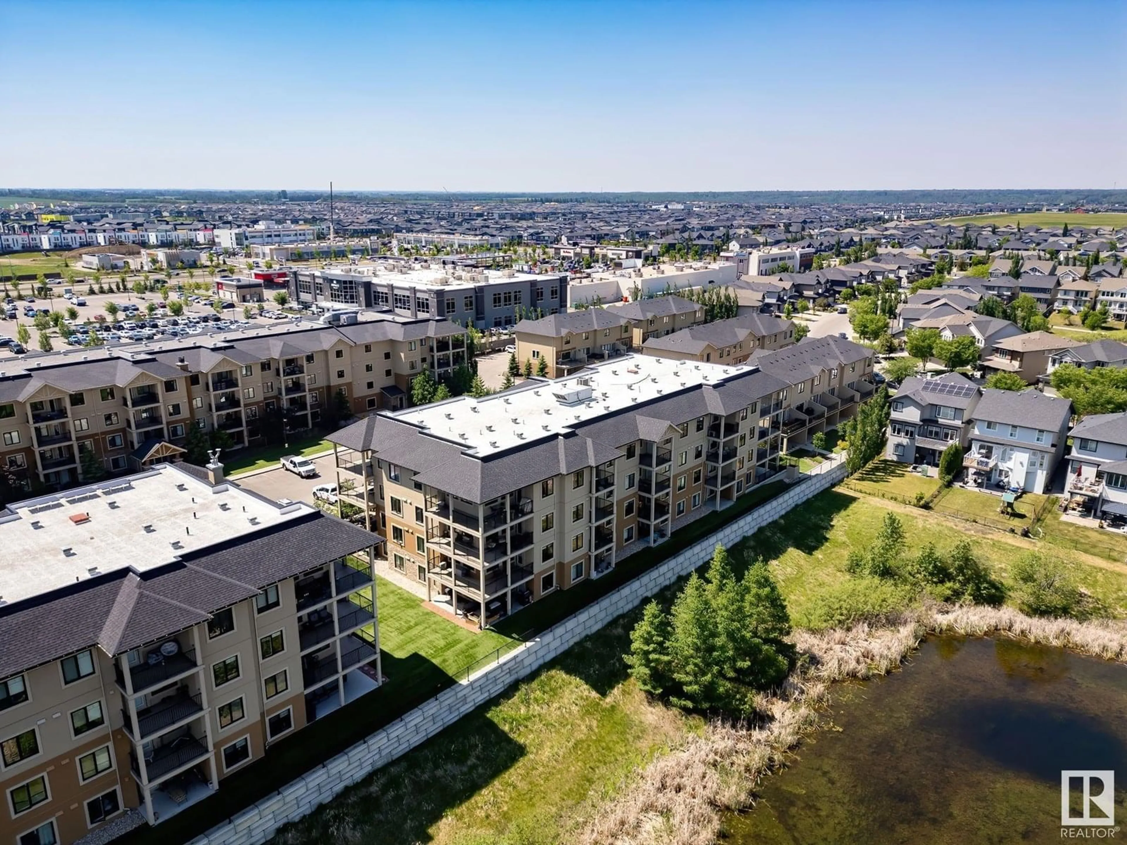 A pic from outside/outdoor area/front of a property/back of a property/a pic from drone, city buildings view from balcony for 201 - 1027 173 ST, Edmonton Alberta T6W3E4
