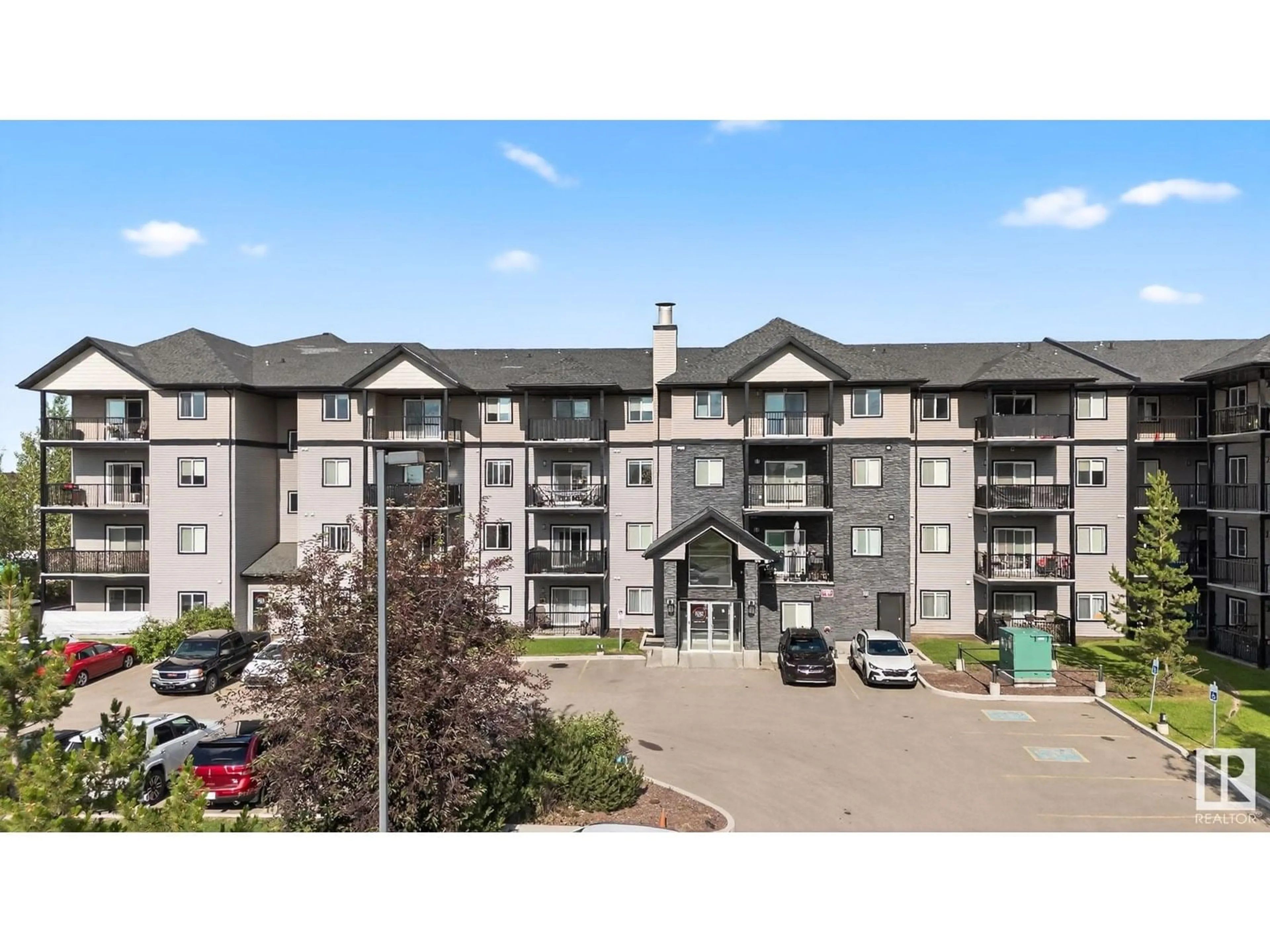 A pic from outside/outdoor area/front of a property/back of a property/a pic from drone, mountain view for #402 - 14808 125 ST NW, Edmonton Alberta T5X0G1
