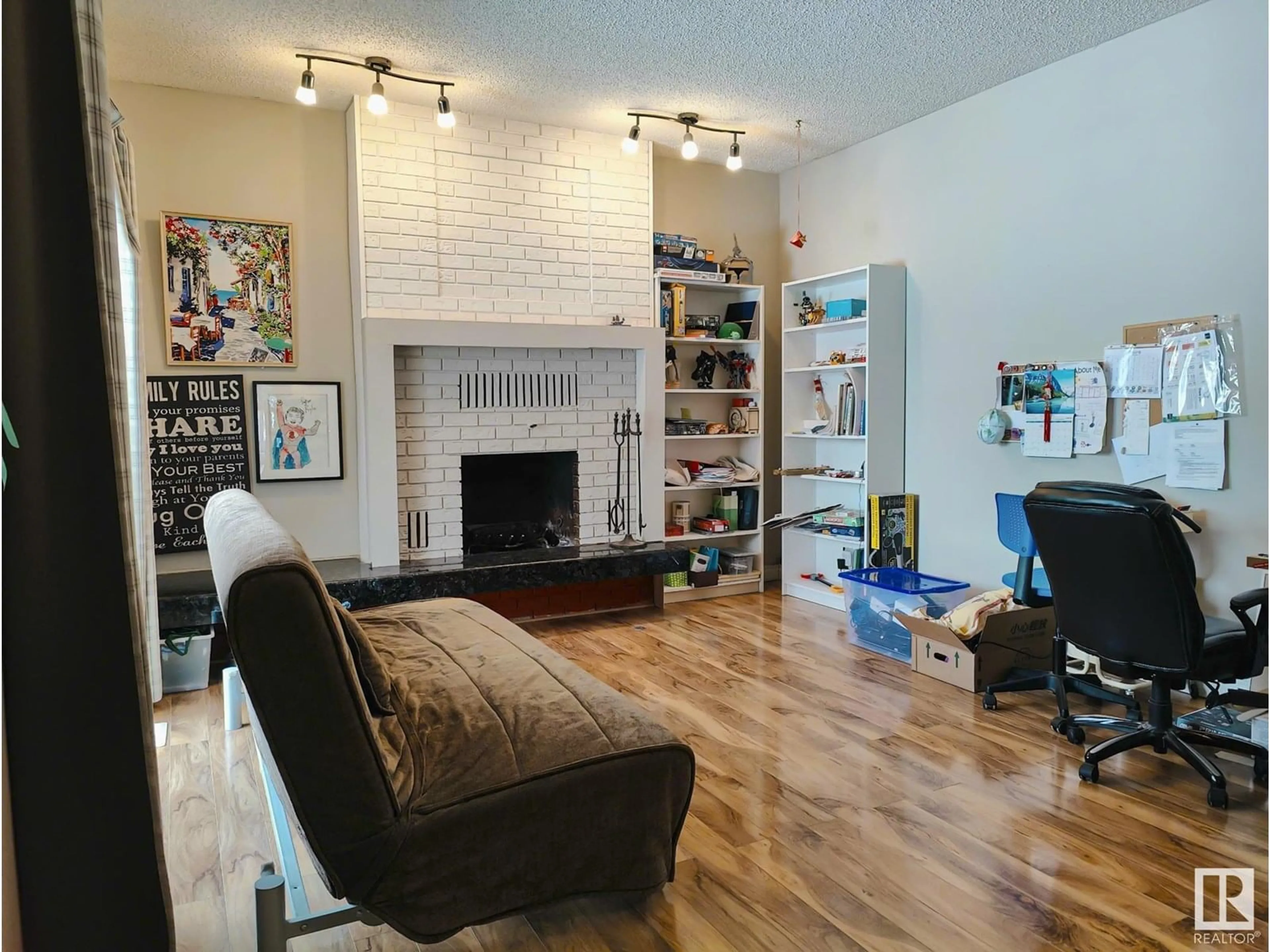 Living room with furniture, unknown for 10420 18 AV, Edmonton Alberta T6J4Z7