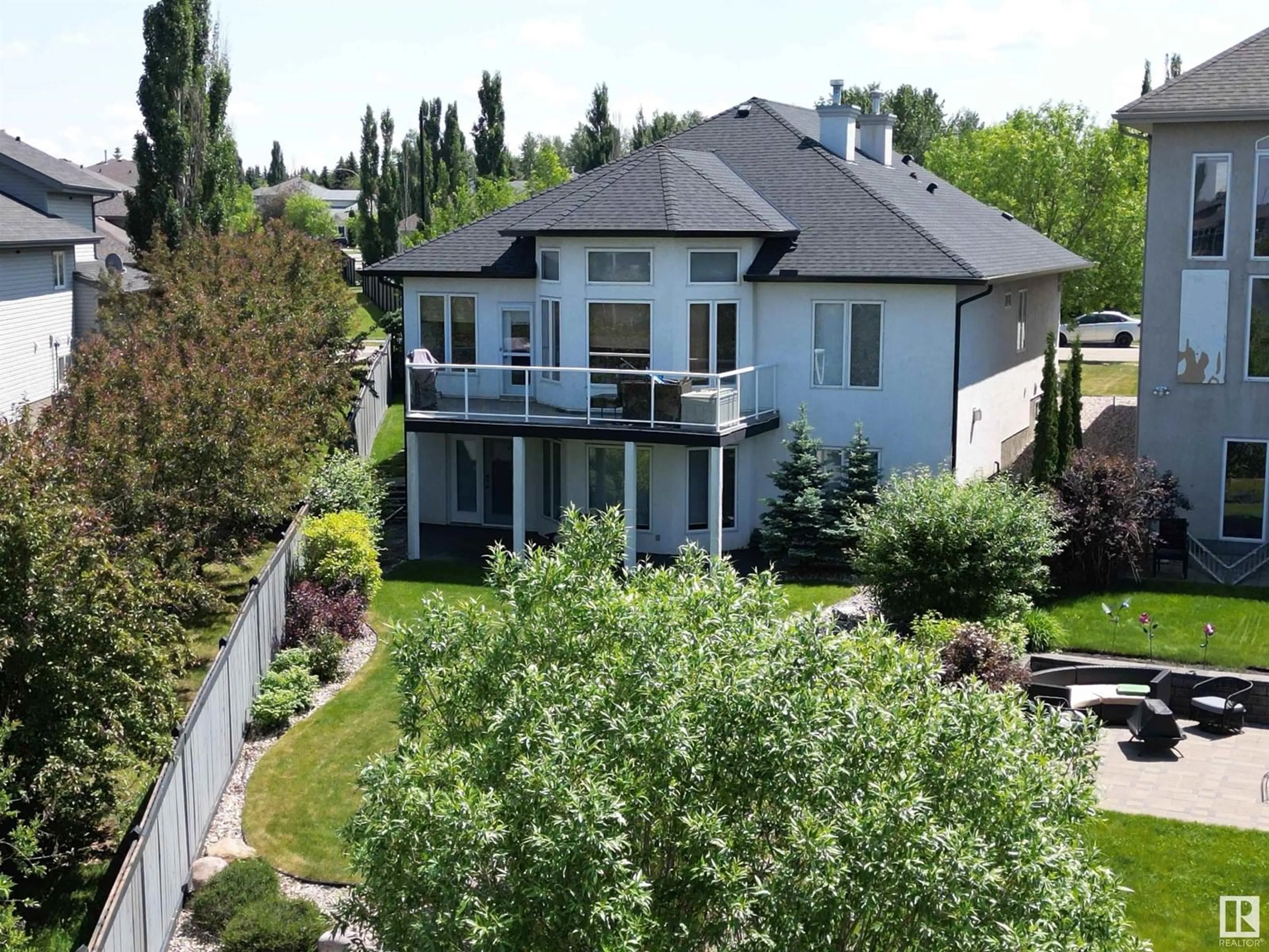 A pic from outside/outdoor area/front of a property/back of a property/a pic from drone, unknown for 46 SHORES DR, Leduc Alberta T9E8N7