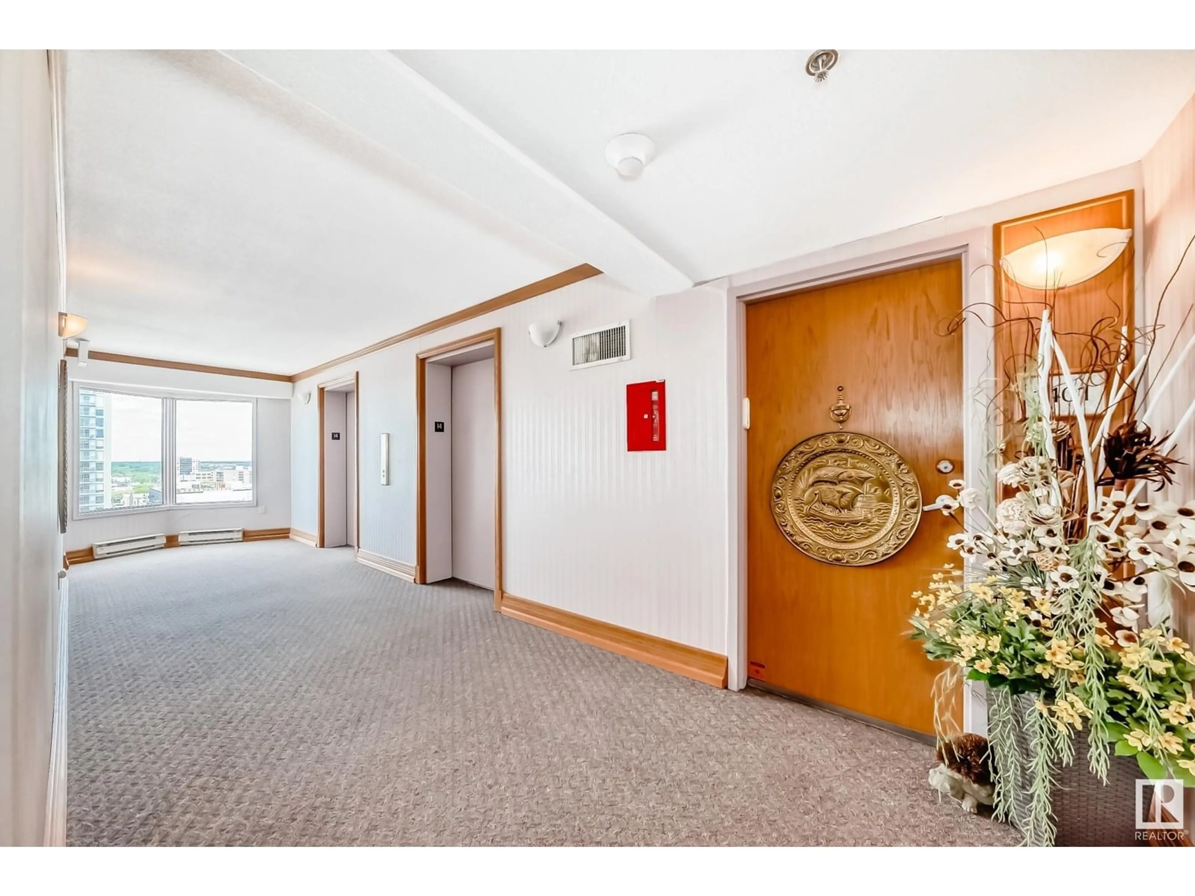 Indoor foyer for 1401 - 12319 JASPER AV, Edmonton Alberta T5N4A7