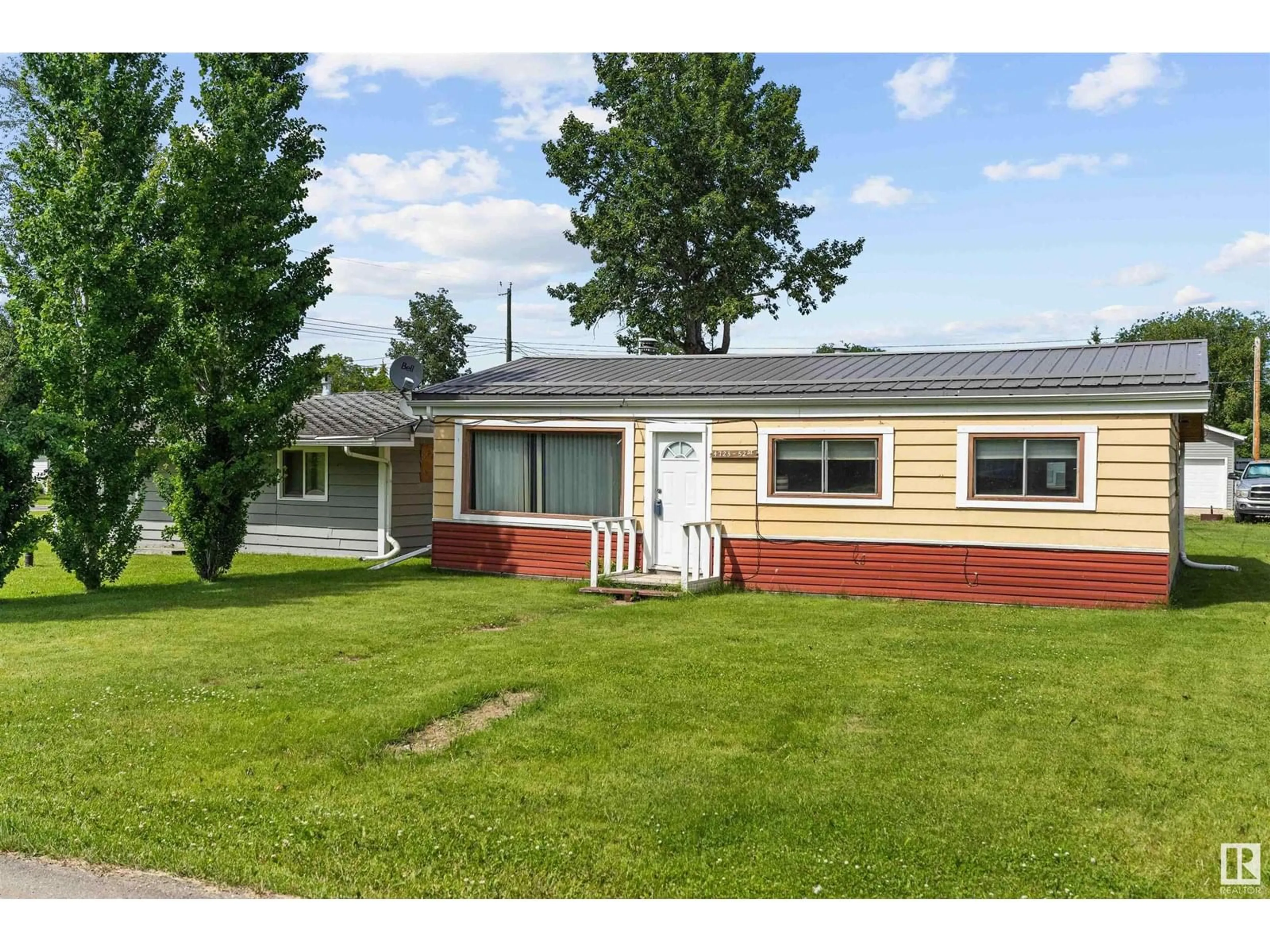 Home with vinyl exterior material, street for 4723 52 ST, Rural Lac Ste. Anne County Alberta T0E0A0
