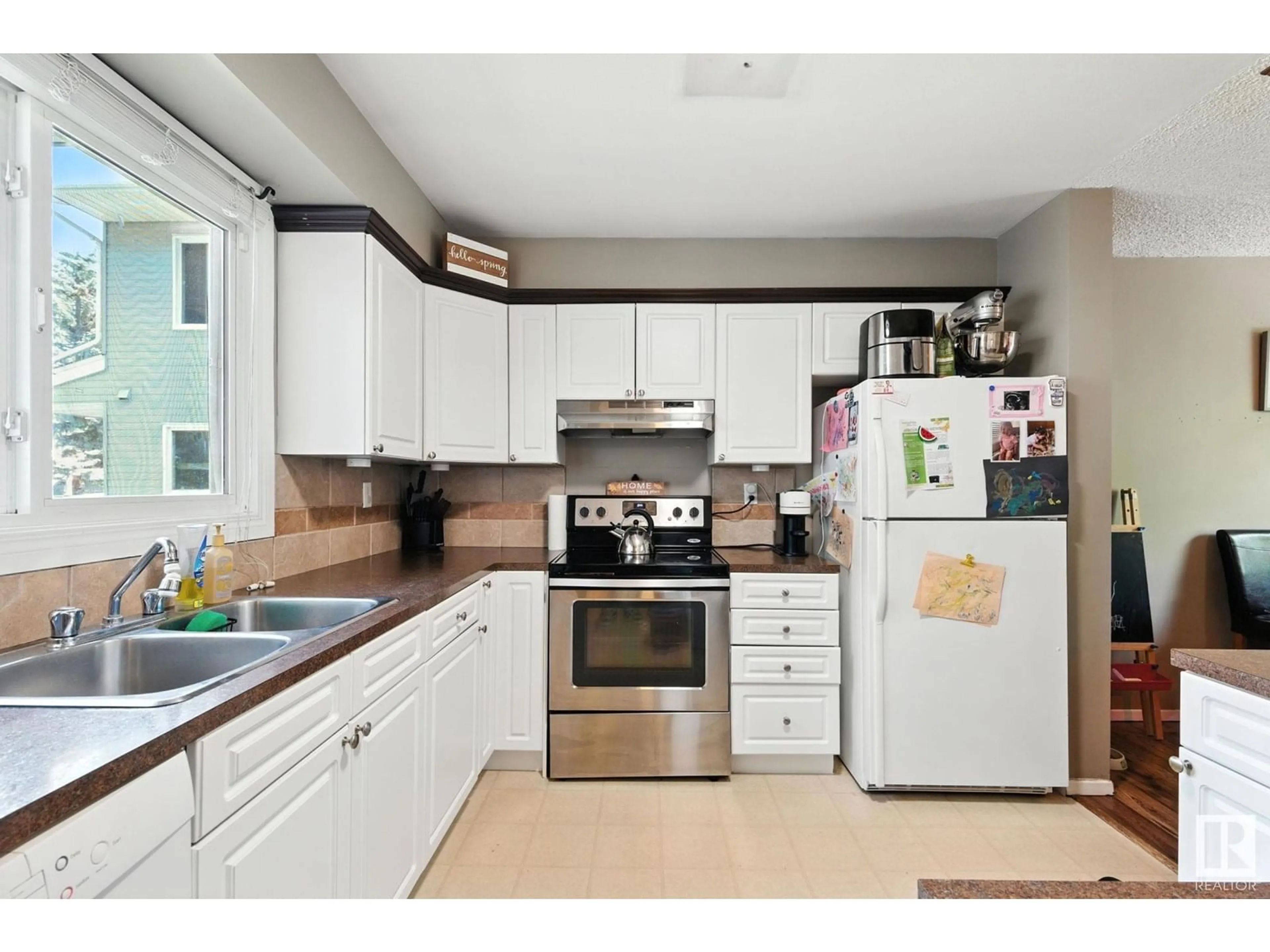 Standard kitchen, wood/laminate floor for #9 - 1415 62 ST, Edmonton Alberta T6L4K1