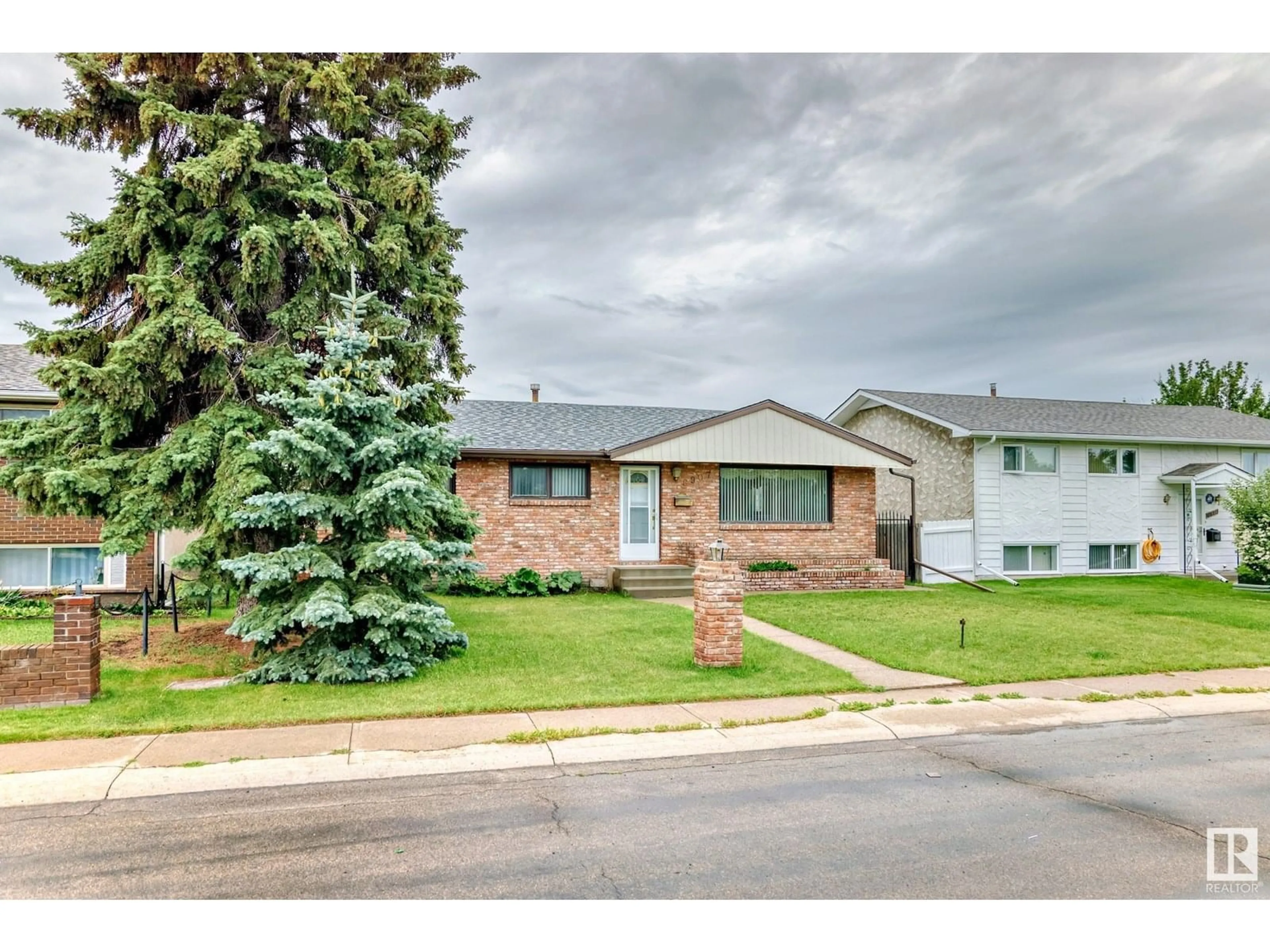 Home with brick exterior material, street for 8907 138 AV, Edmonton Alberta T5E2A7