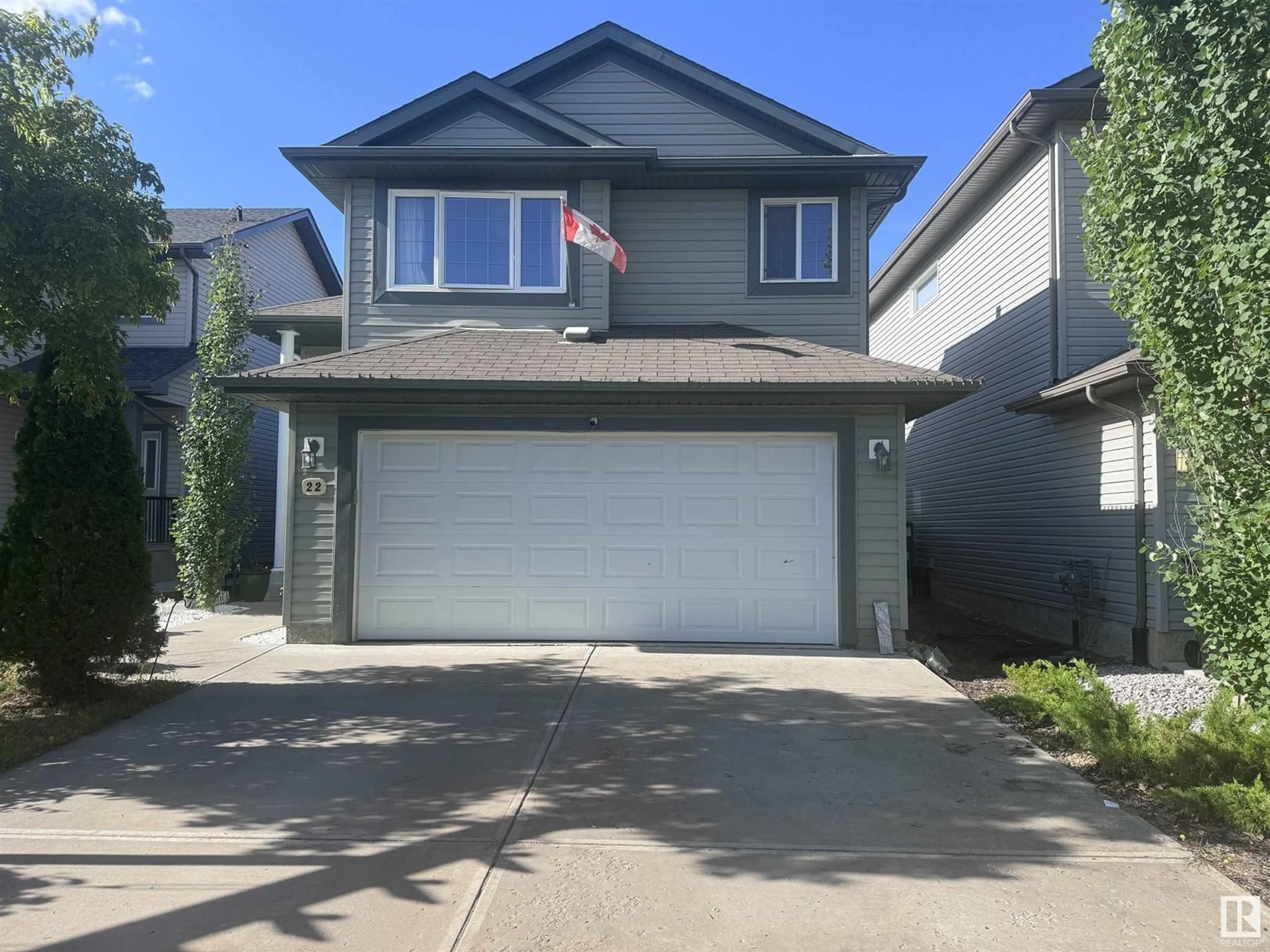 Home with vinyl exterior material, street for 20822 96A AV, Edmonton Alberta T5T4E7