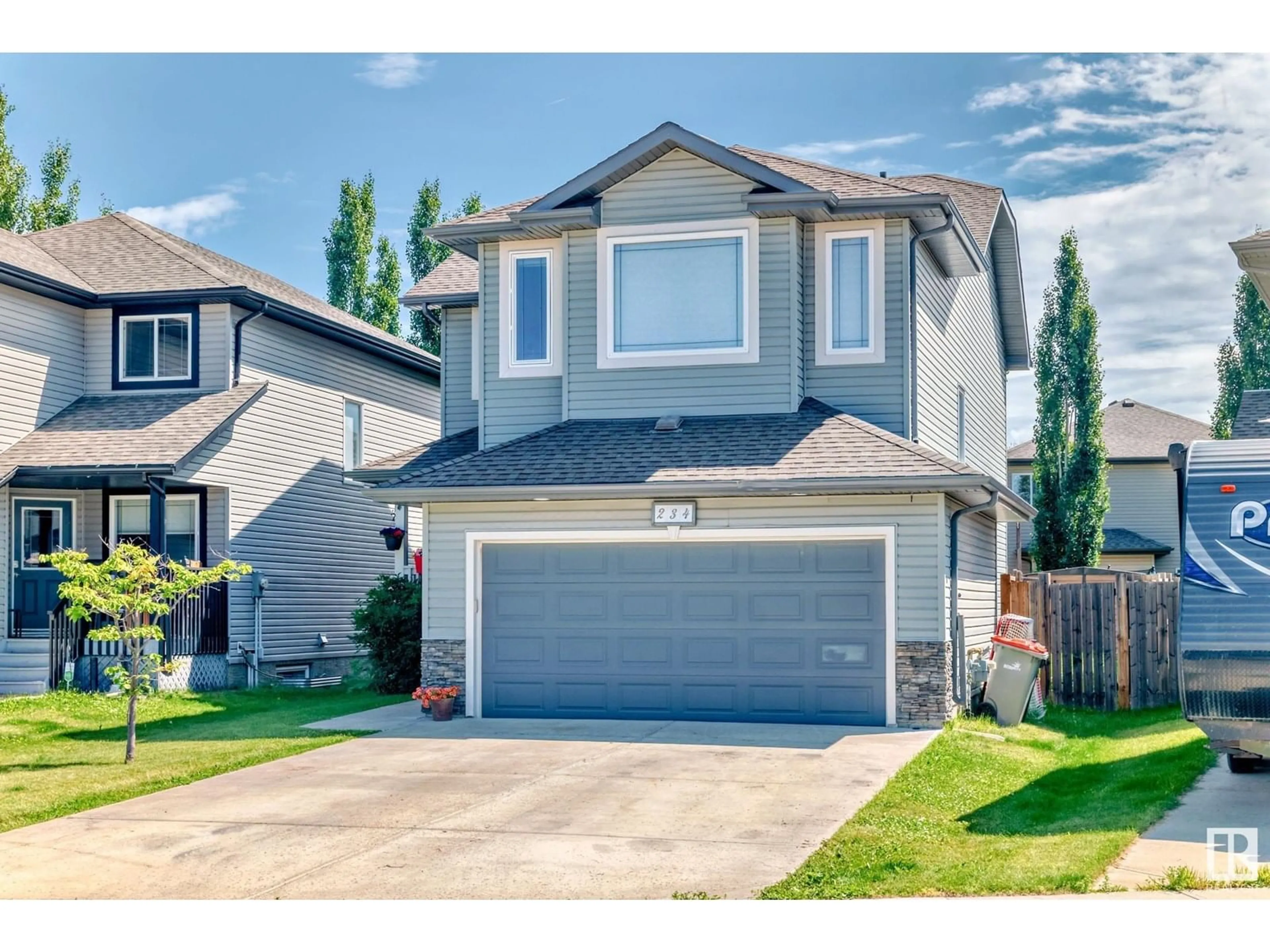 Home with vinyl exterior material, street for 234 SILVERSTONE CR, Stony Plain Alberta T7Z0E8