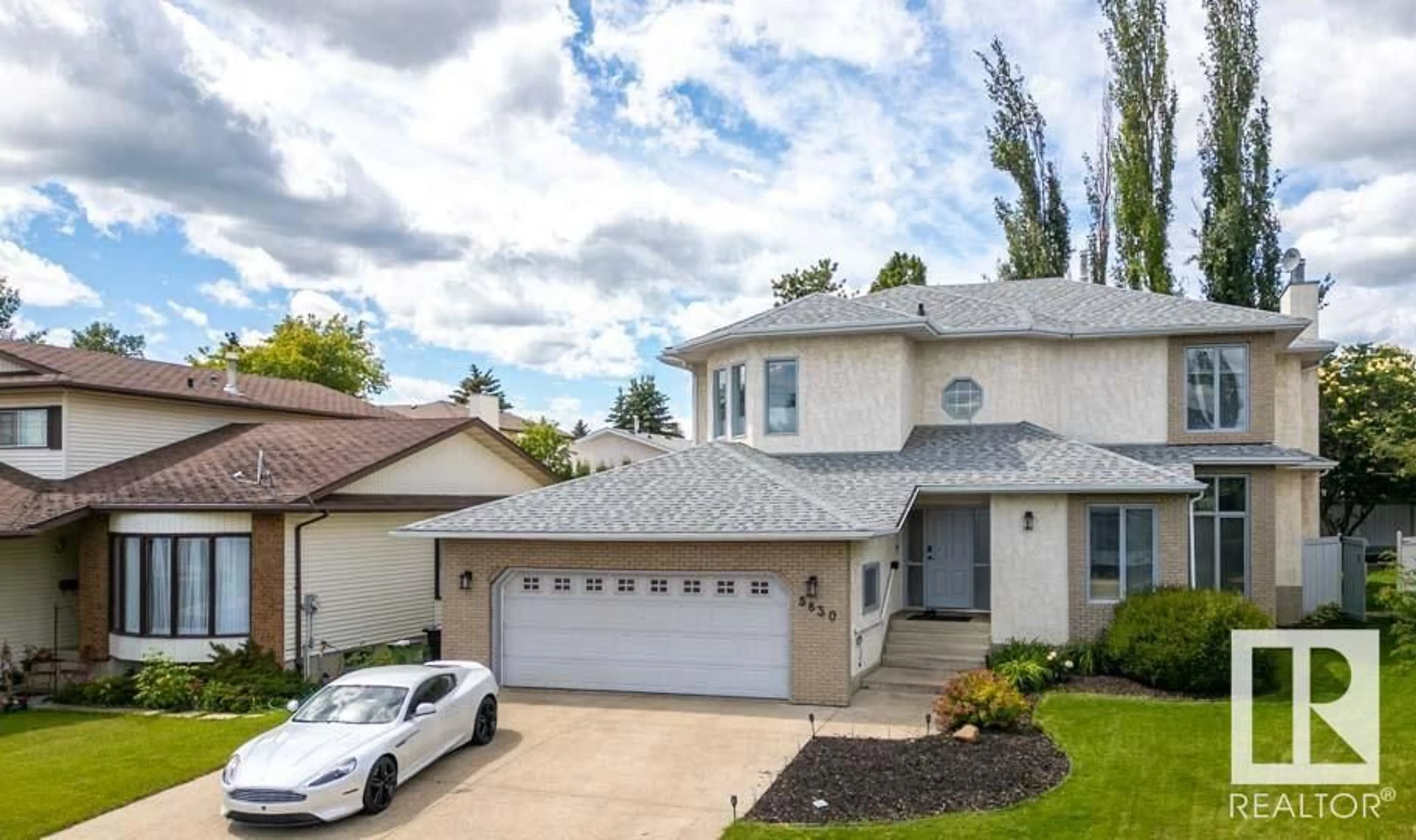 Home with vinyl exterior material, street for NW - 5830 181 ST, Edmonton Alberta T6M1V6