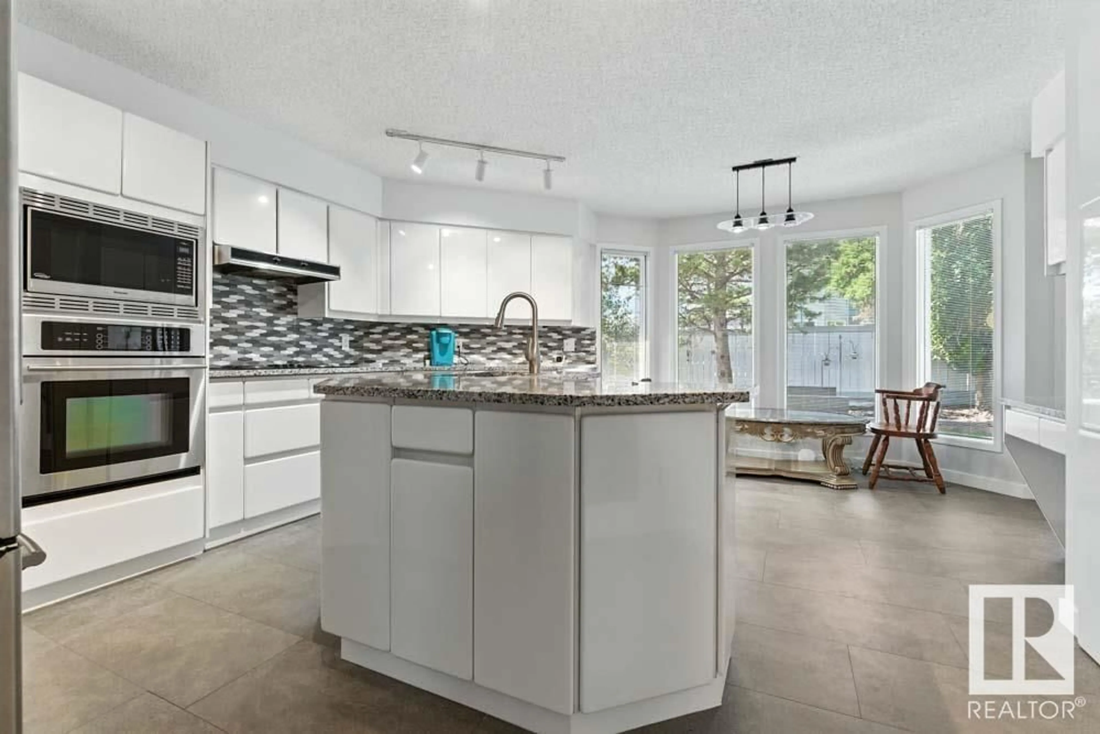 Open concept kitchen, ceramic/tile floor for NW - 5830 181 ST, Edmonton Alberta T6M1V6