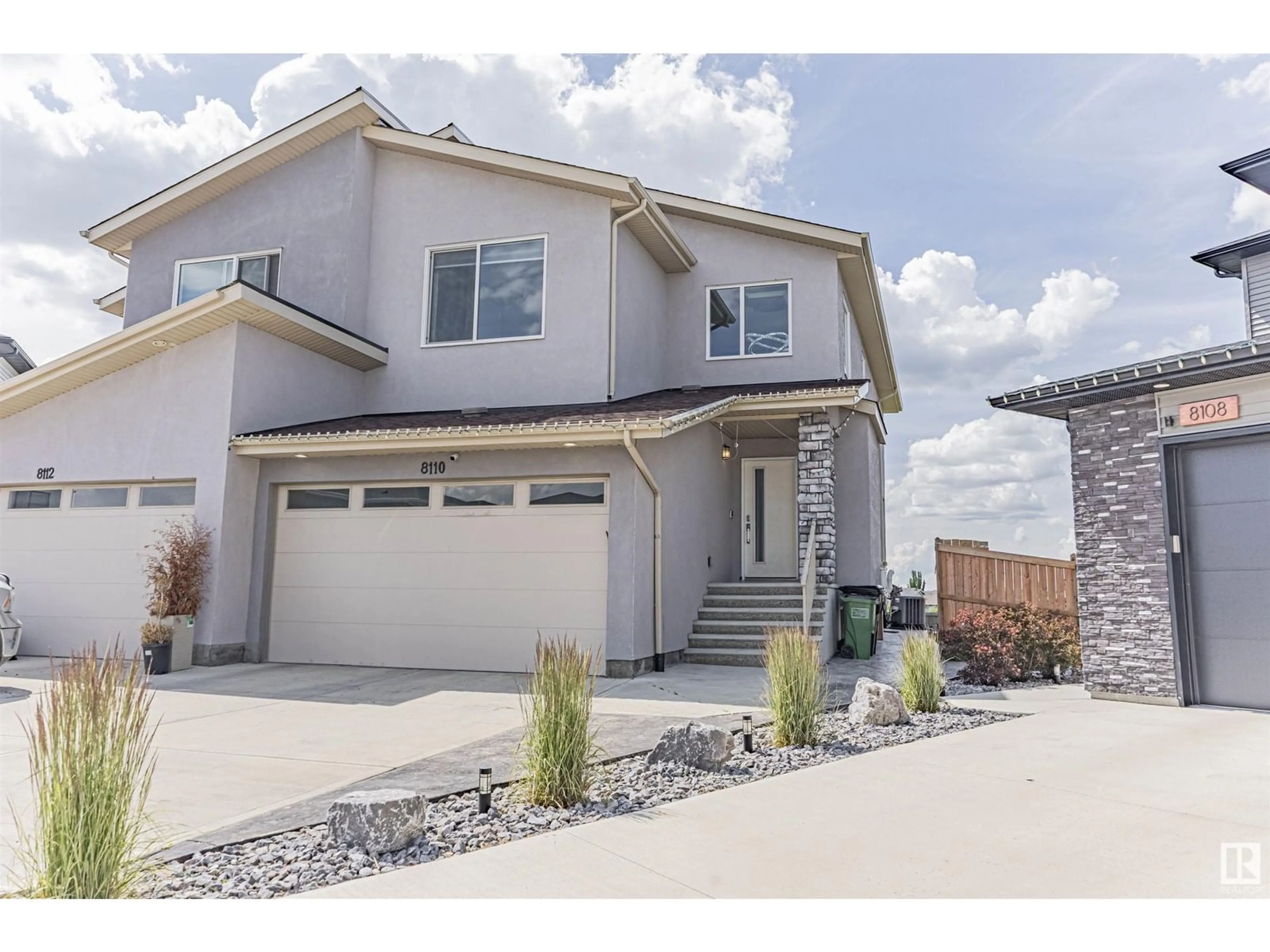 Home with vinyl exterior material, street for 8110 174A AV NW, Edmonton Alberta T5Z0R7