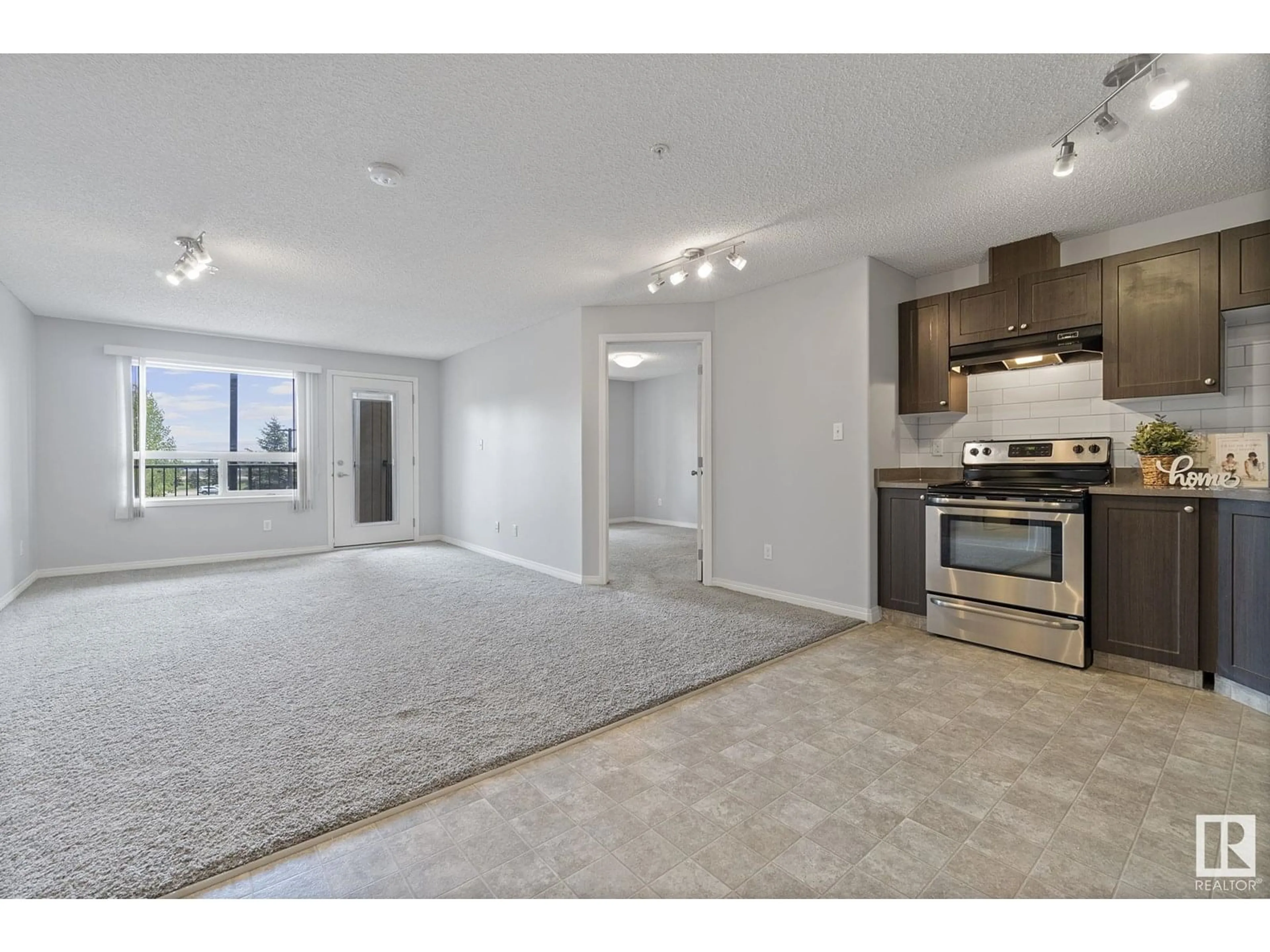 Open concept kitchen, unknown for #214 - 1520 HAMMOND GATE GA, Edmonton Alberta T6M0J4