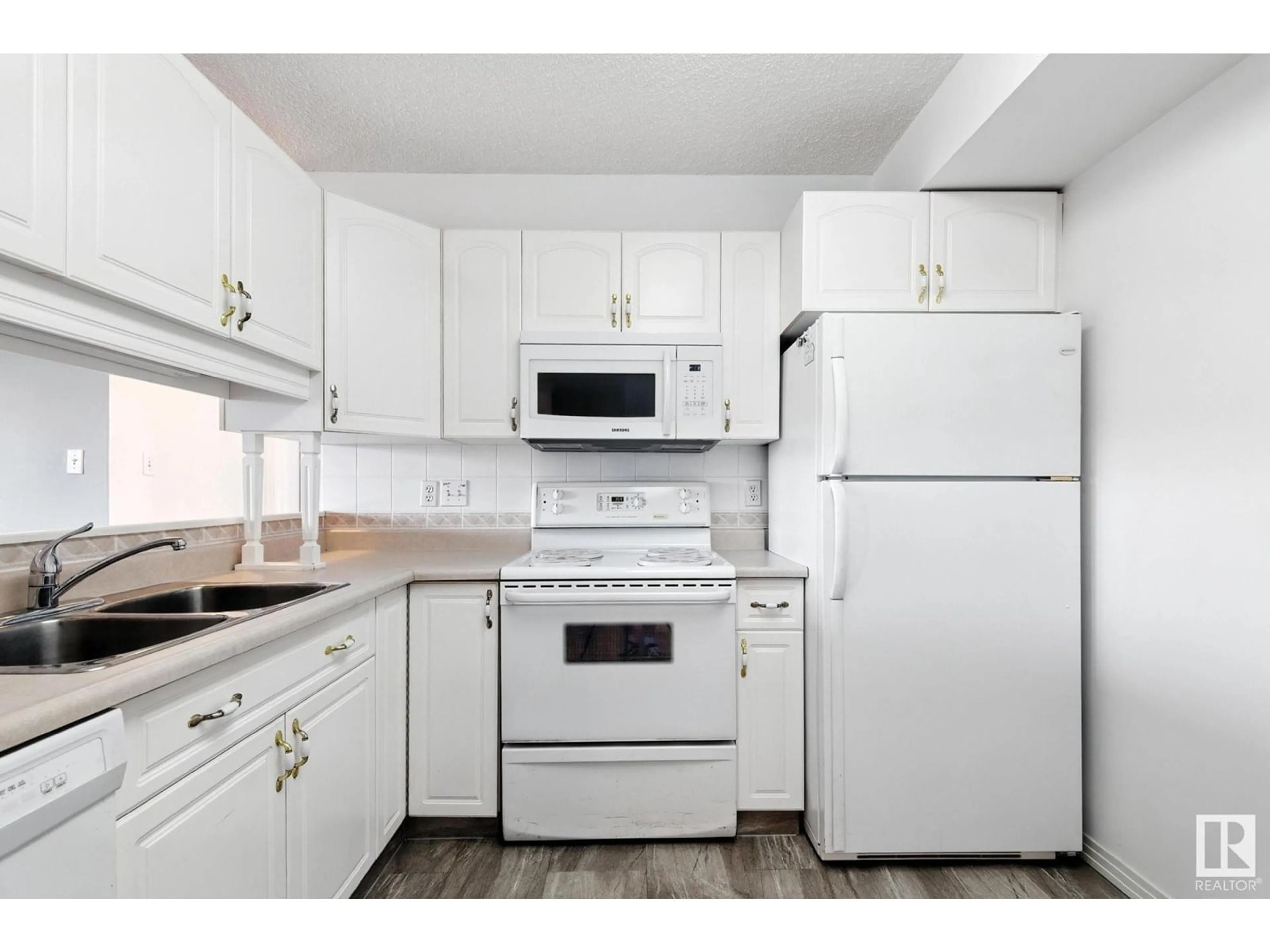 Standard kitchen, wood/laminate floor for 308 - 17150 94A AV NW, Edmonton Alberta T5T6L7