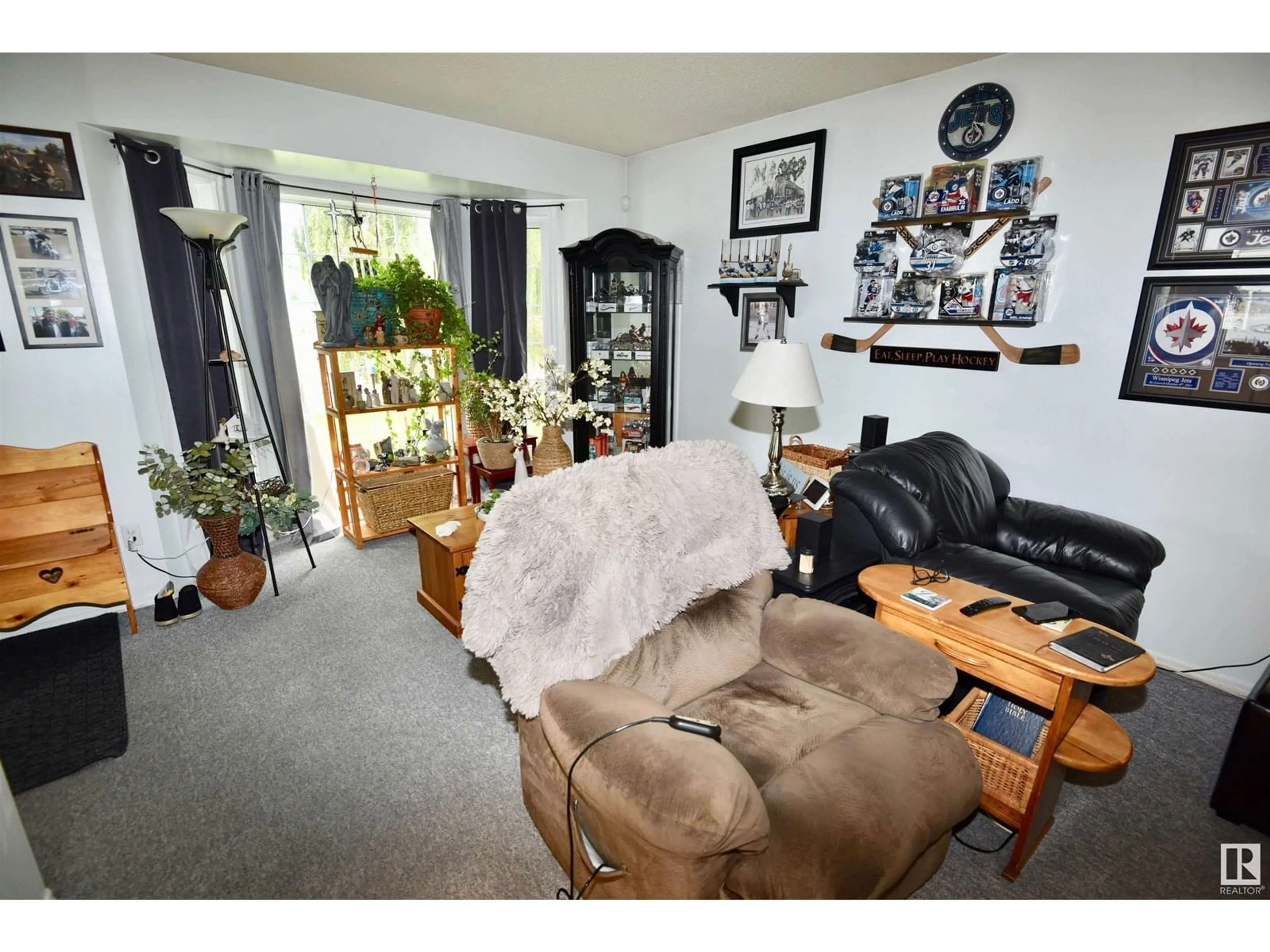 Living room with furniture, unknown for 12215 63 ST, Edmonton Alberta T5W5G7