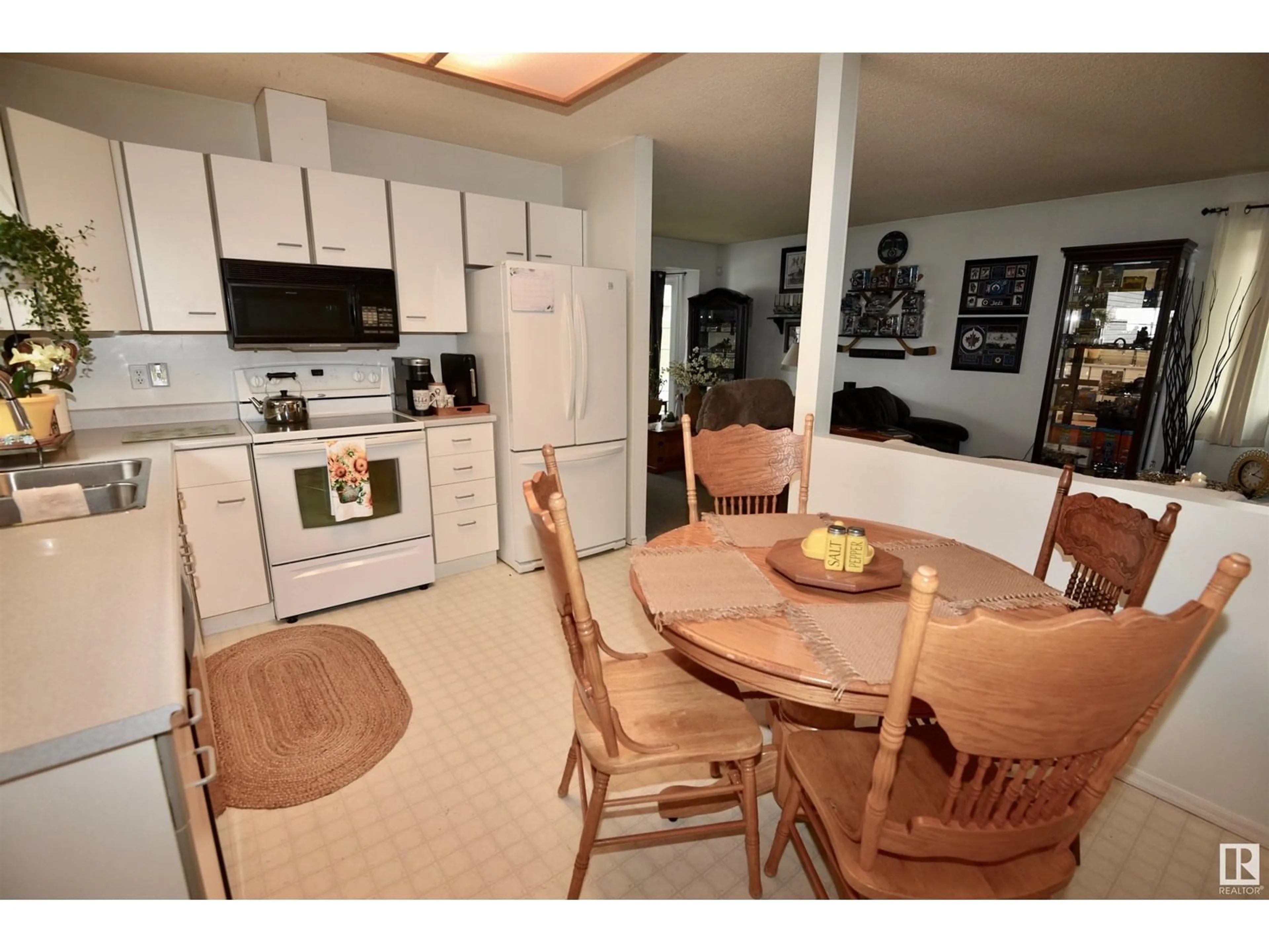 Open concept kitchen, unknown for 12215 63 ST, Edmonton Alberta T5W5G7