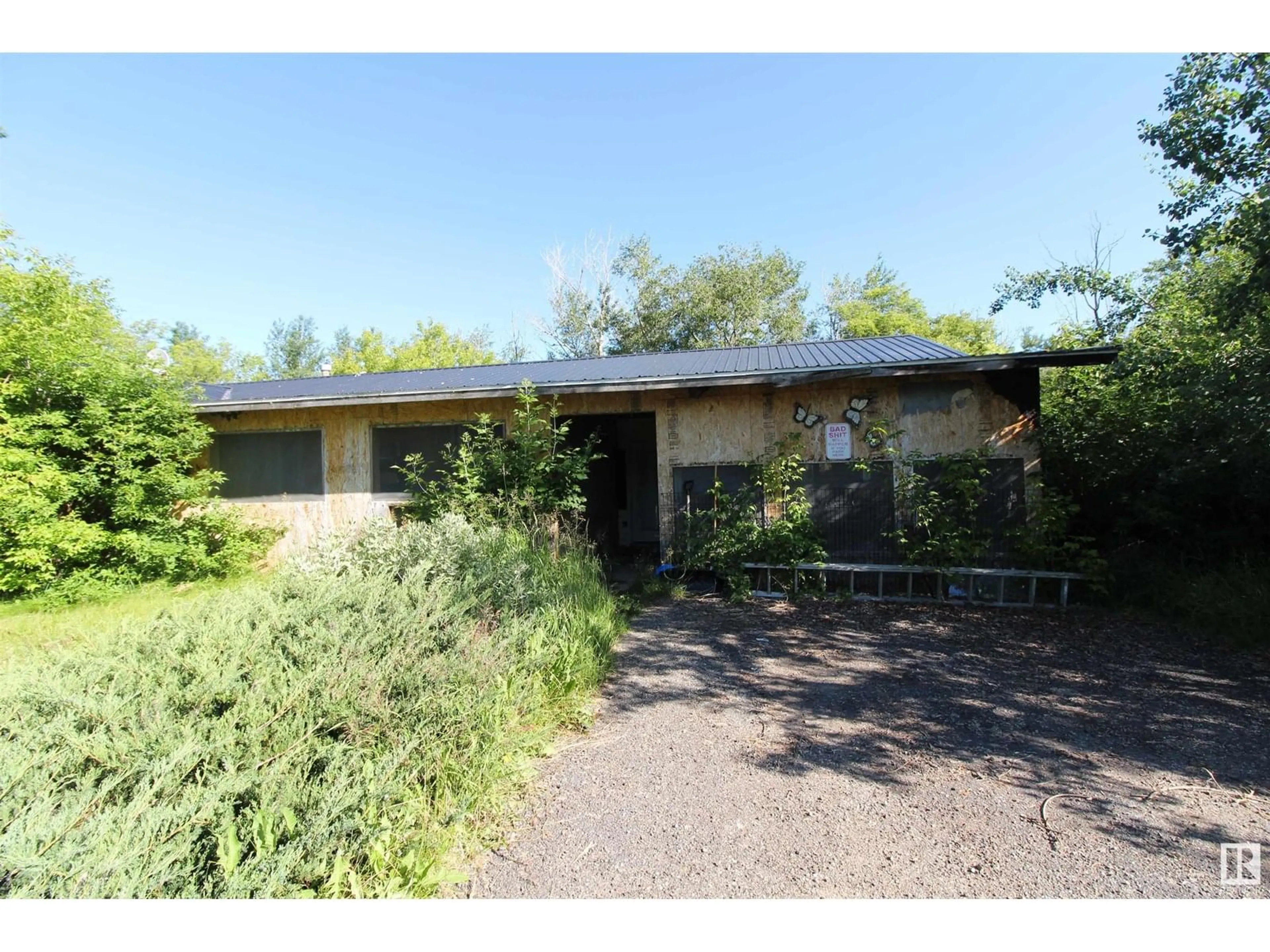 A pic from outside/outdoor area/front of a property/back of a property/a pic from drone, street for 59211 HWY 2, Rural Westlock County Alberta T0G0P0