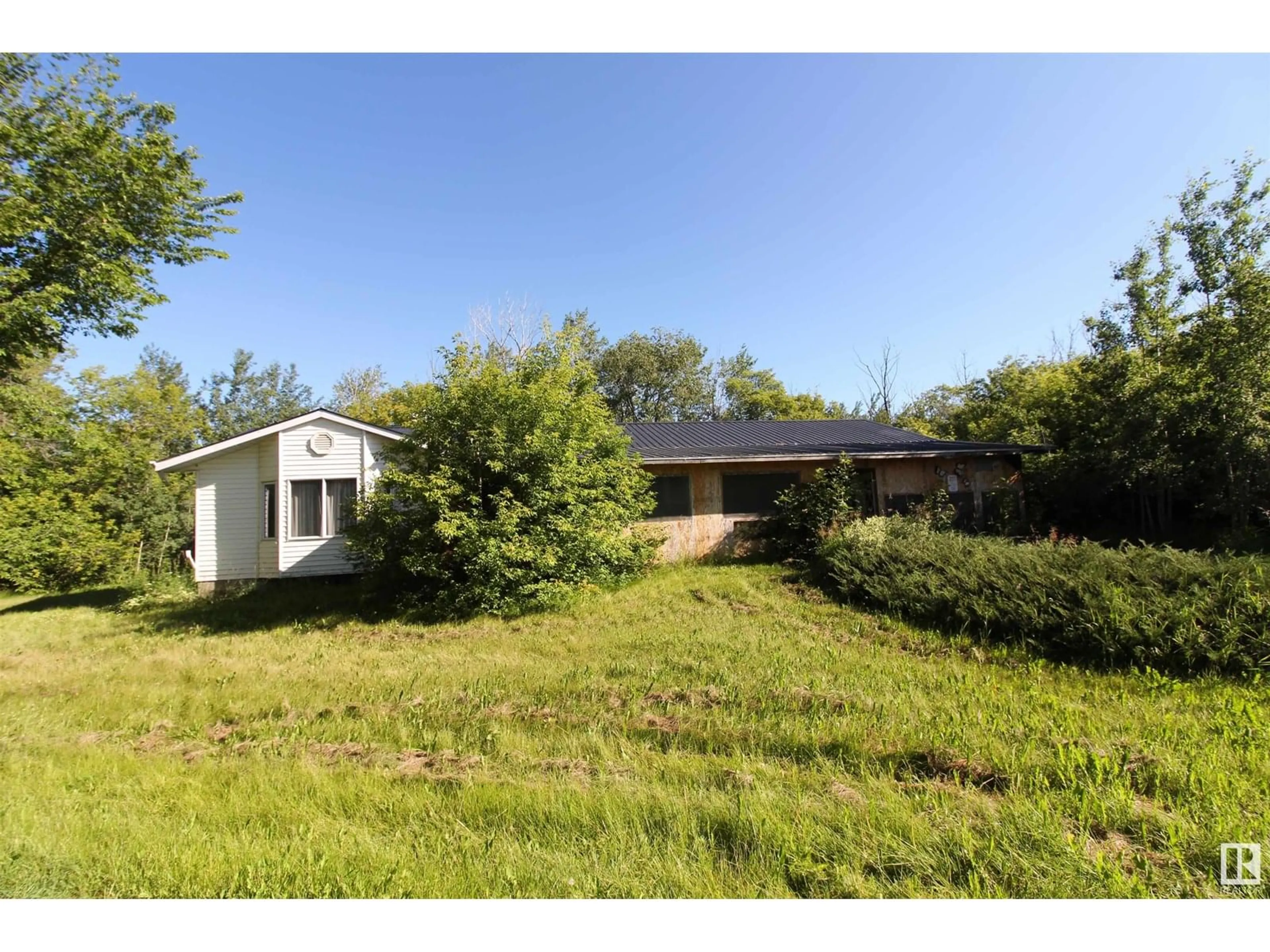 A pic from outside/outdoor area/front of a property/back of a property/a pic from drone, unknown for 59211 HWY 2, Rural Westlock County Alberta T0G0P0