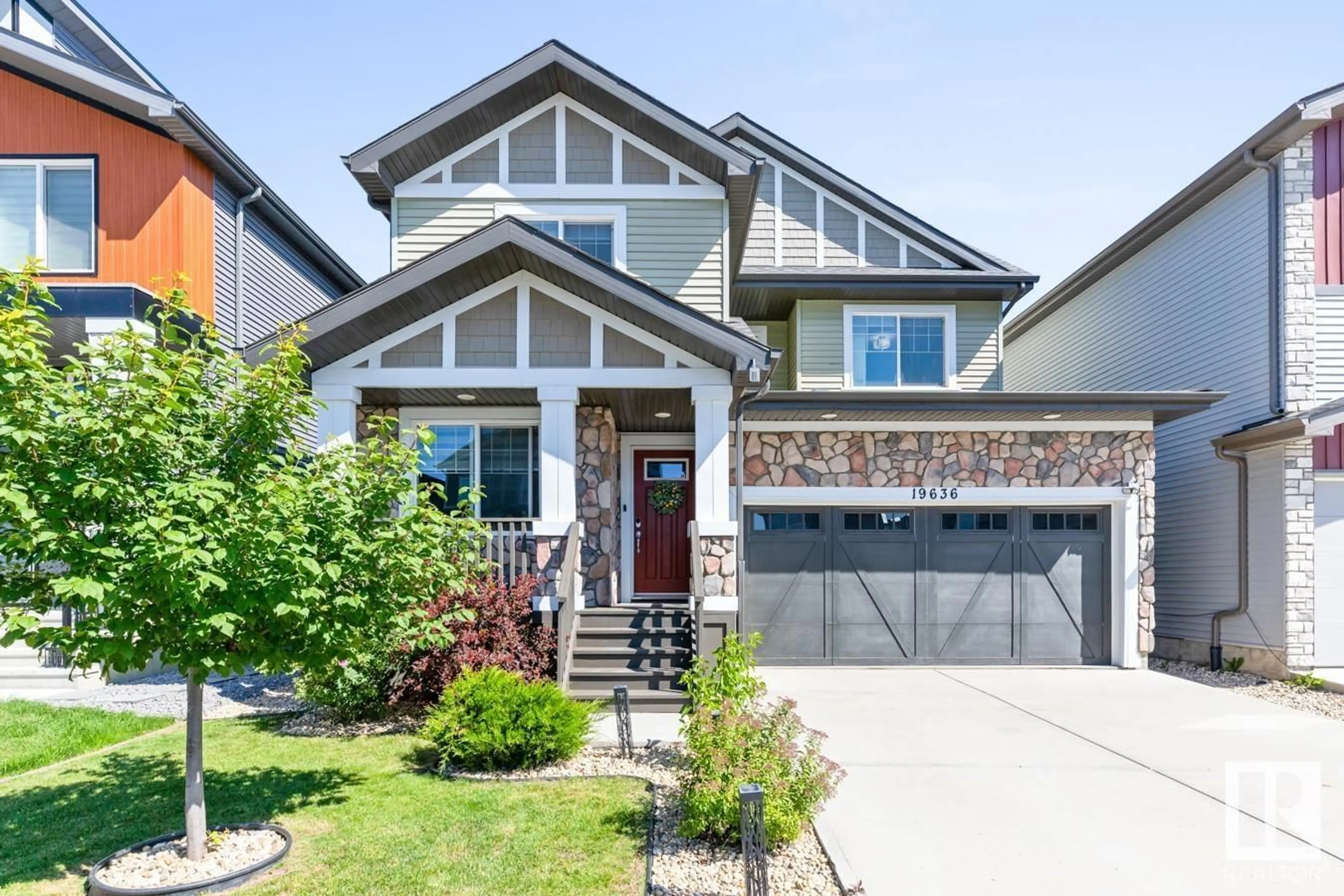 Home with vinyl exterior material, street for 19636 26 AV, Edmonton Alberta T6M0X4