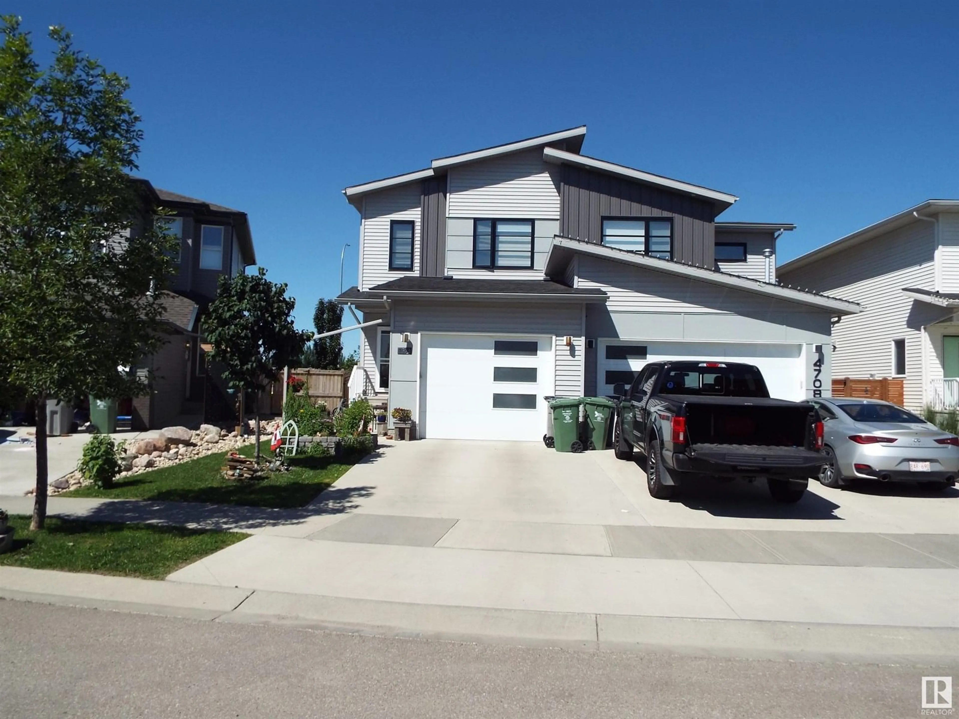 Home with vinyl exterior material, street for 4706 67 ST, Beaumont Alberta T4X1Z9