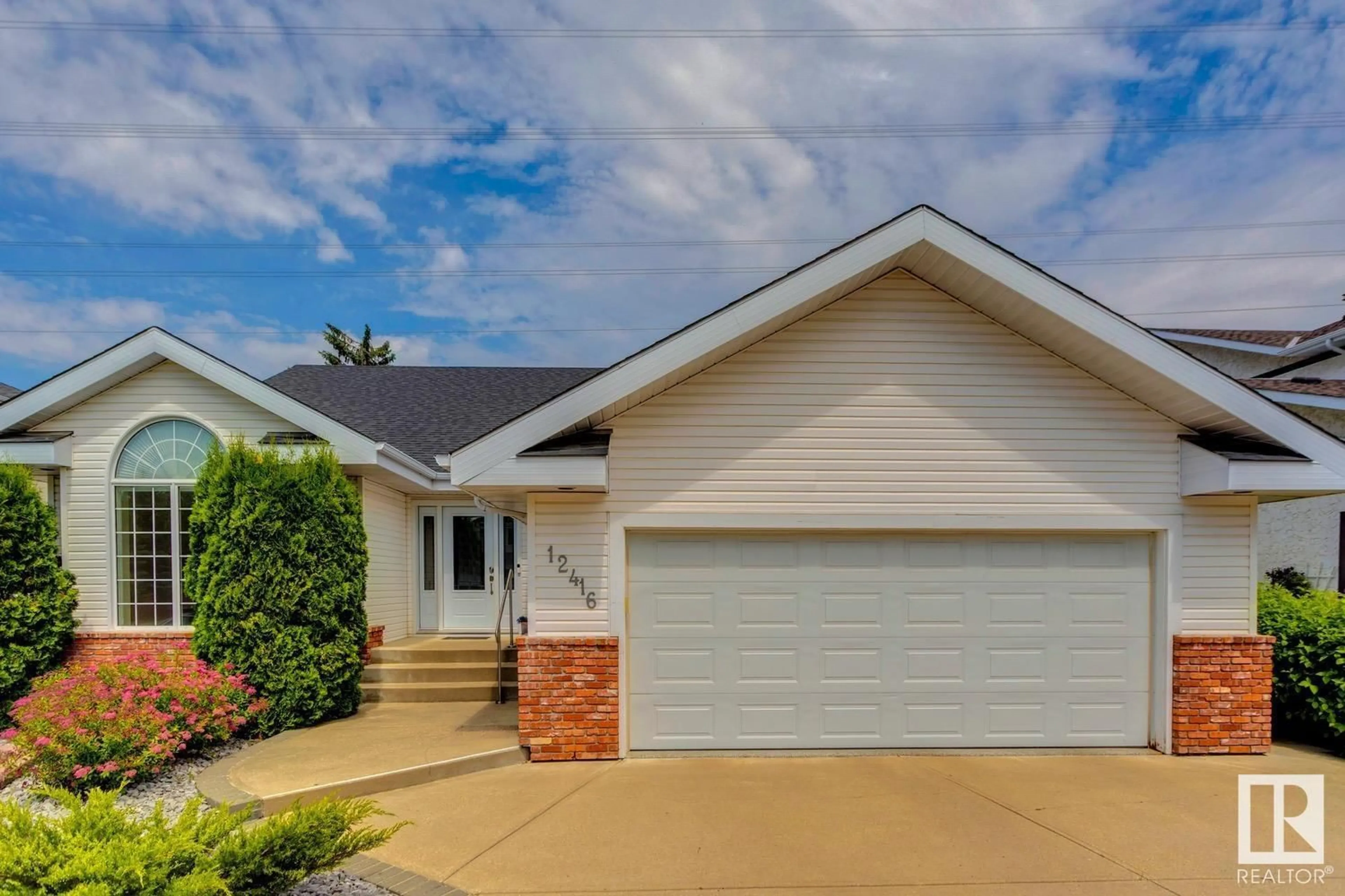 Home with vinyl exterior material, street for 12416 29A AV, Edmonton Alberta T6J6C6