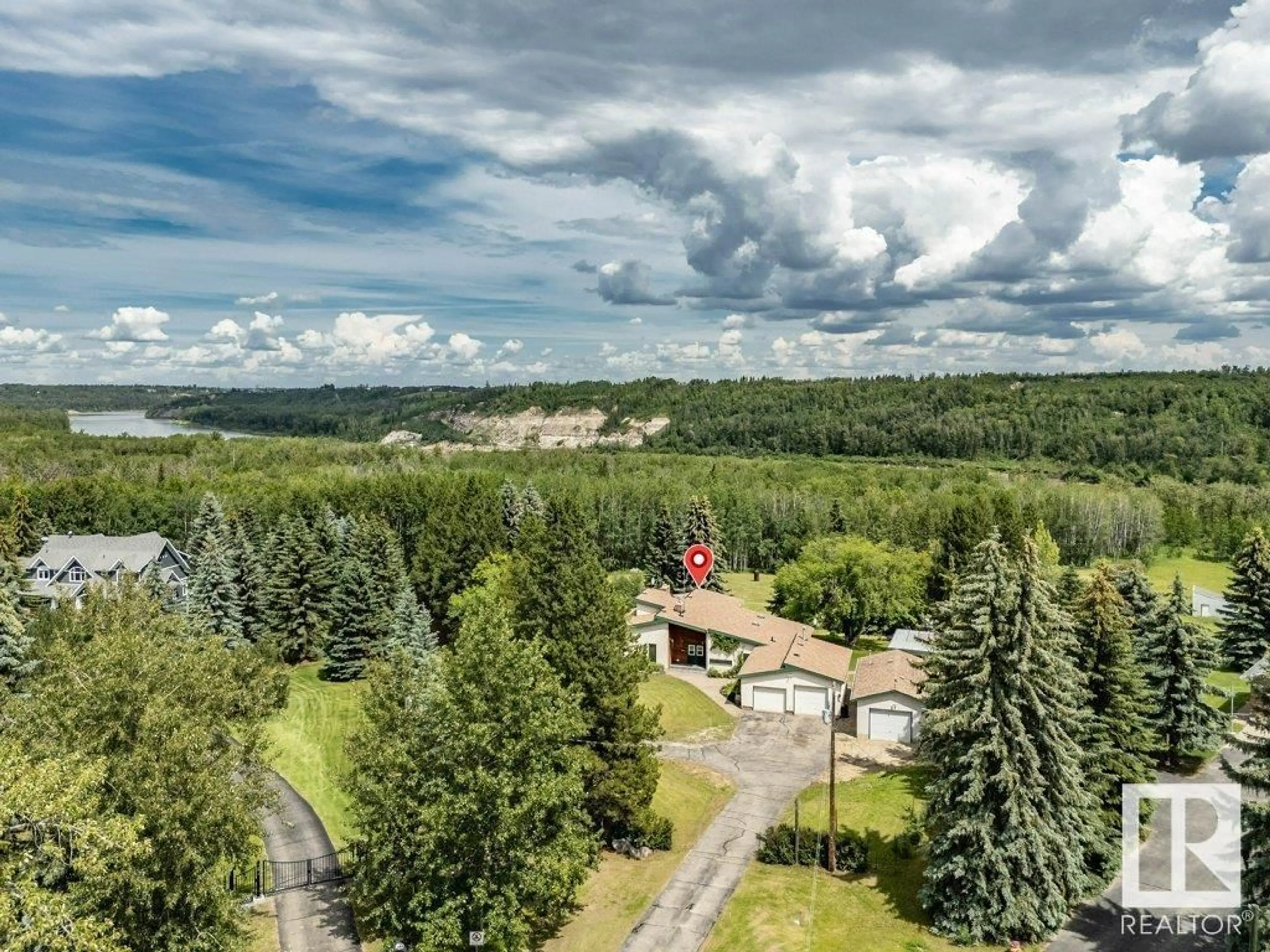 A pic from outside/outdoor area/front of a property/back of a property/a pic from drone, forest/trees view for 51209 - 18 RGE RD 255, Rural Parkland County Alberta T7Y1A8