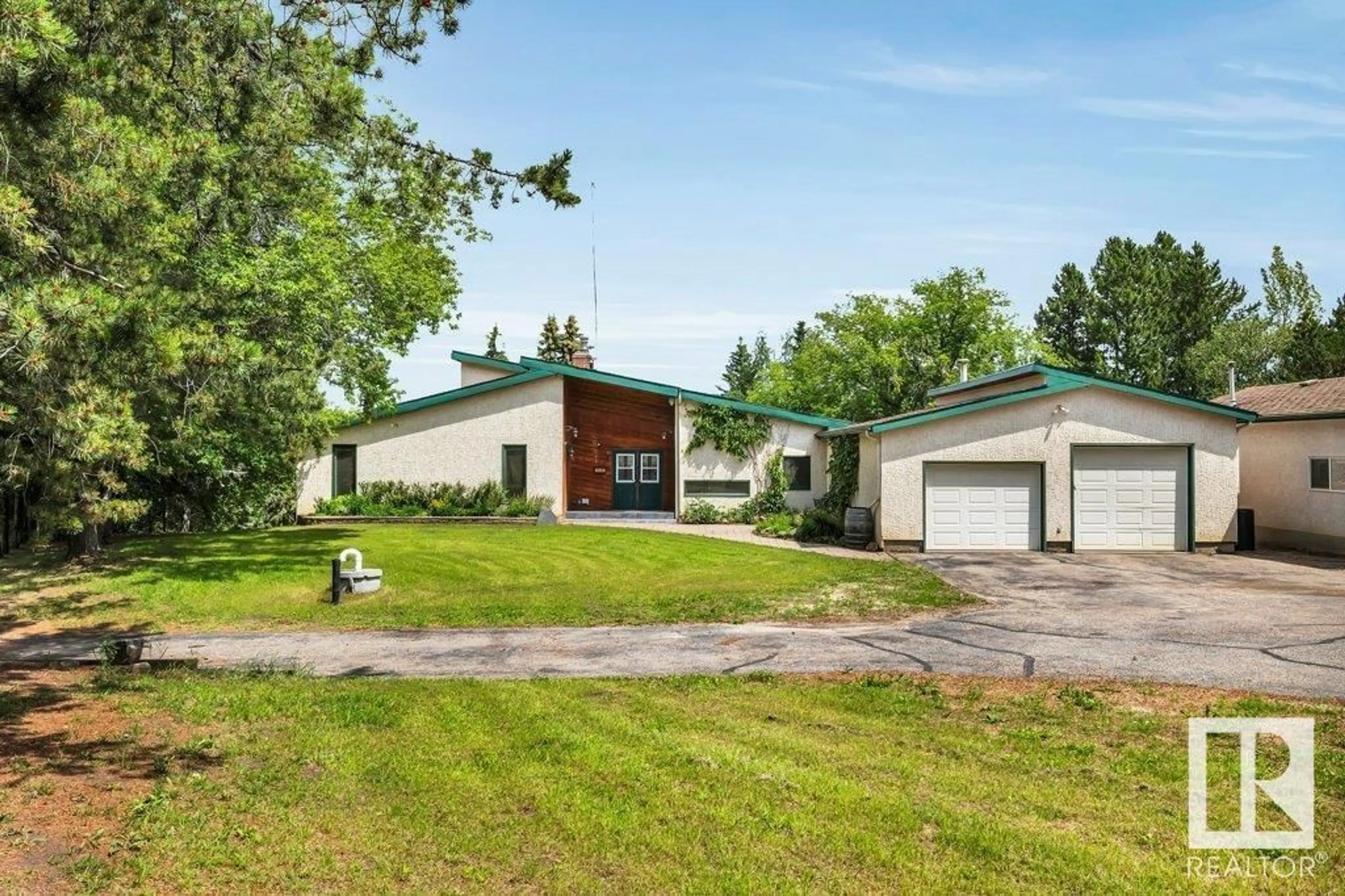A pic from outside/outdoor area/front of a property/back of a property/a pic from drone, unknown for 51209 - 18 RGE RD 255, Rural Parkland County Alberta T7Y1A8