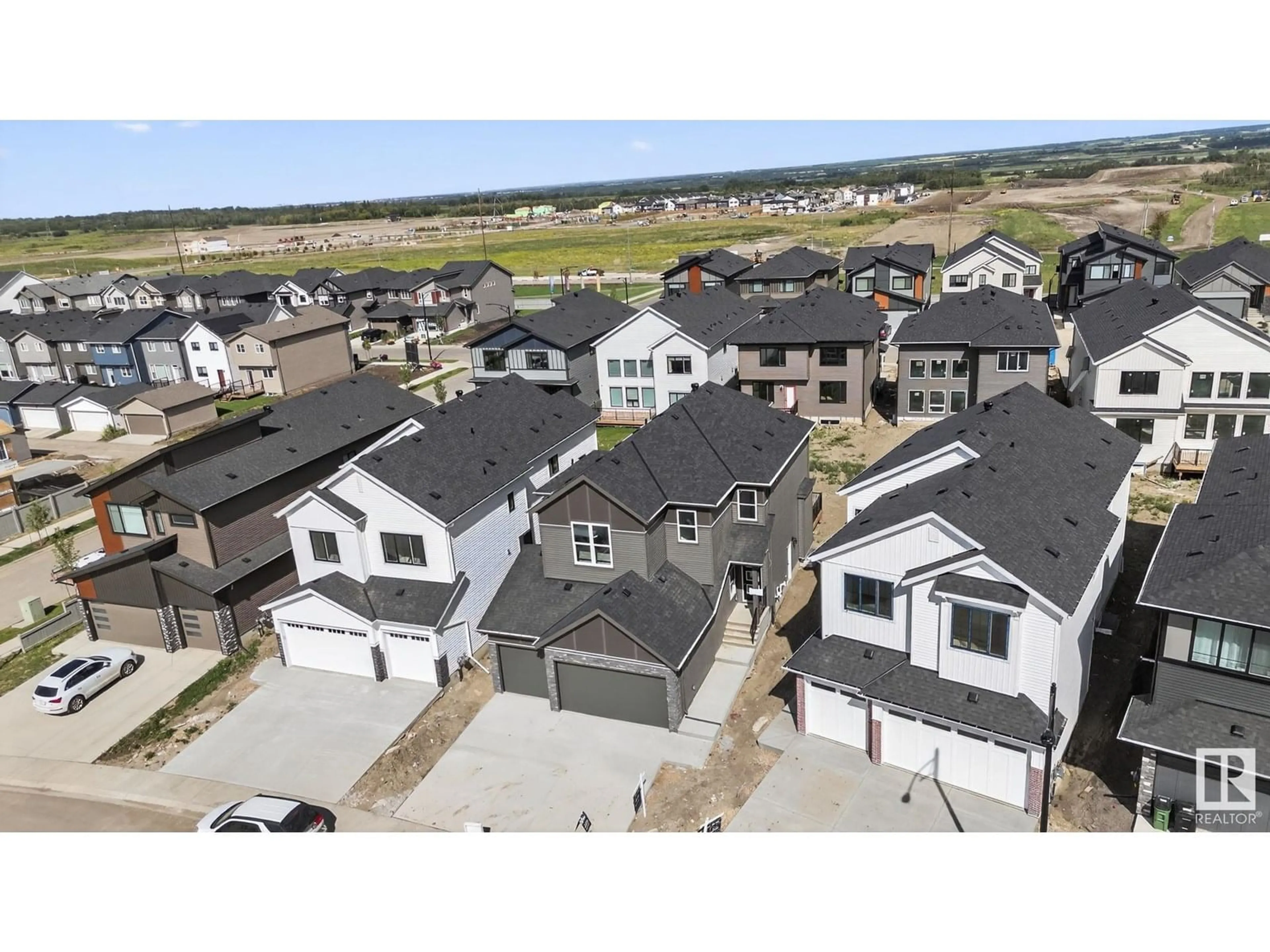 A pic from outside/outdoor area/front of a property/back of a property/a pic from drone, street for 17119 3 ST, Edmonton Alberta T5Y4G8