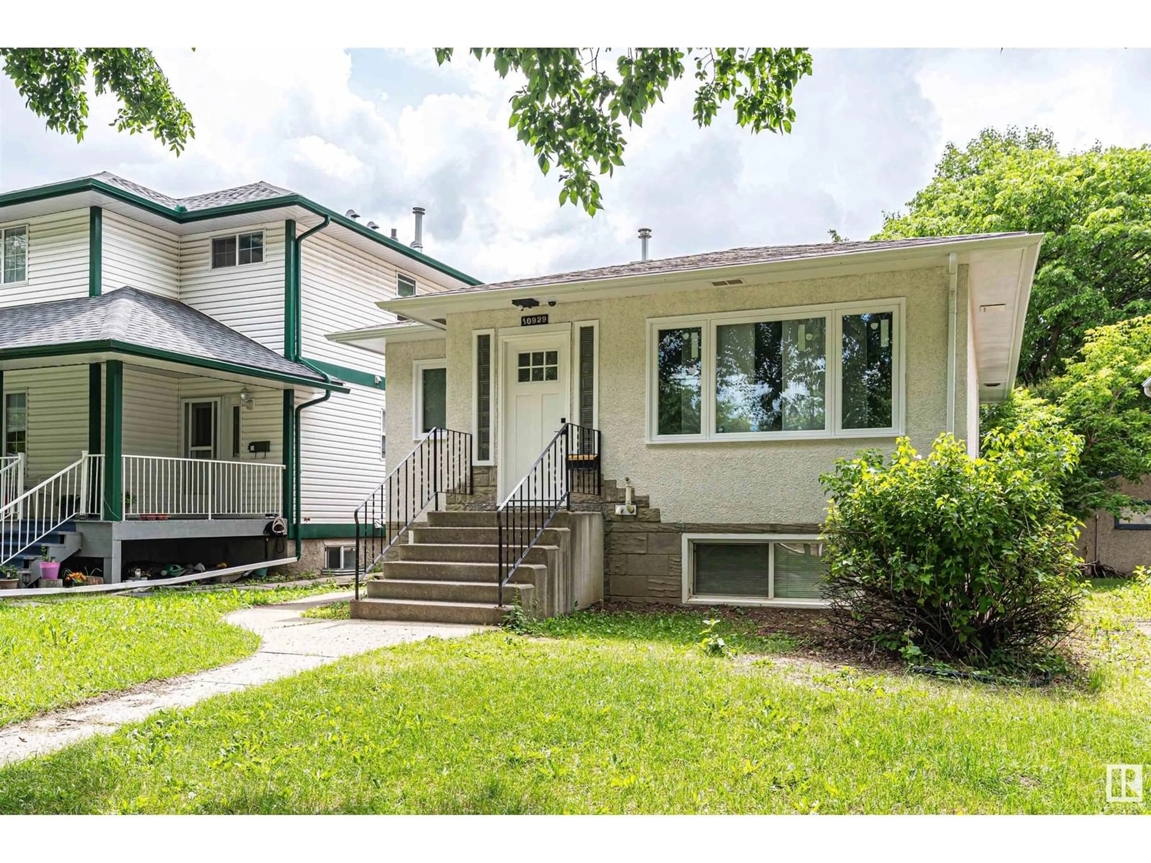 Home with vinyl exterior material, street for 10929 74 AV, Edmonton Alberta T6G0E5
