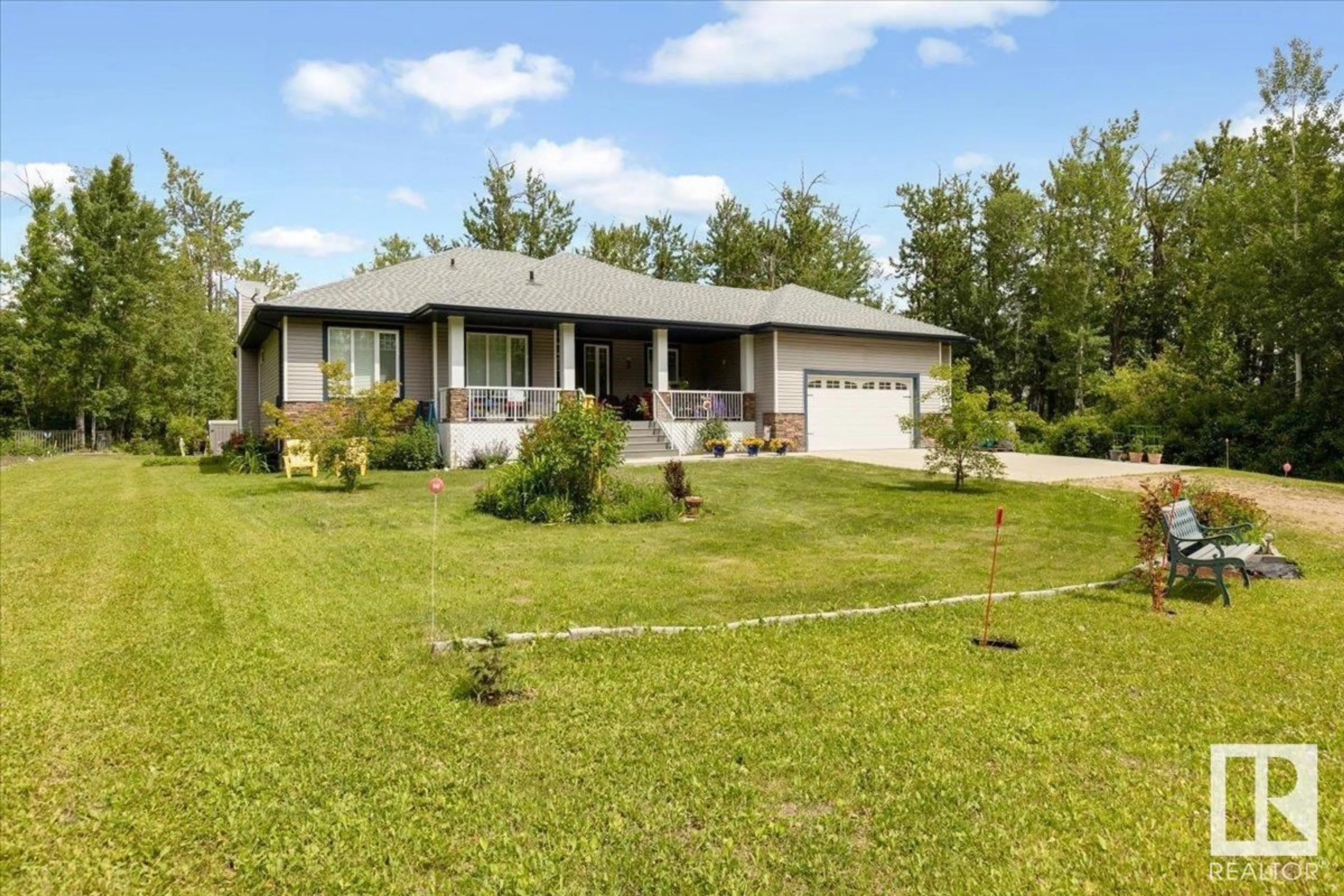 A pic from outside/outdoor area/front of a property/back of a property/a pic from drone, unknown for 56503 - 49 RGE RD 231, Rural Sturgeon County Alberta T0A1N4