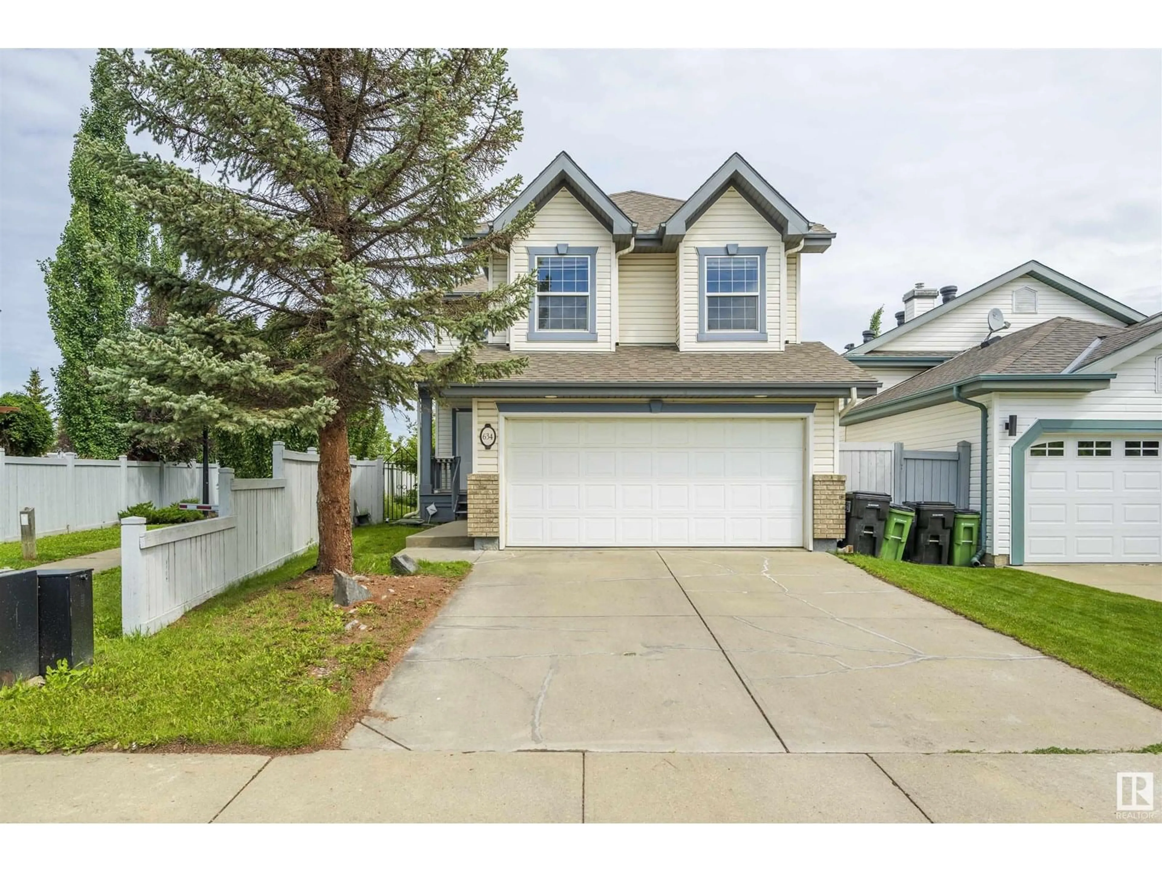 Home with vinyl exterior material, street for 634 GLENWRIGHT CR, Edmonton Alberta T5T6K6
