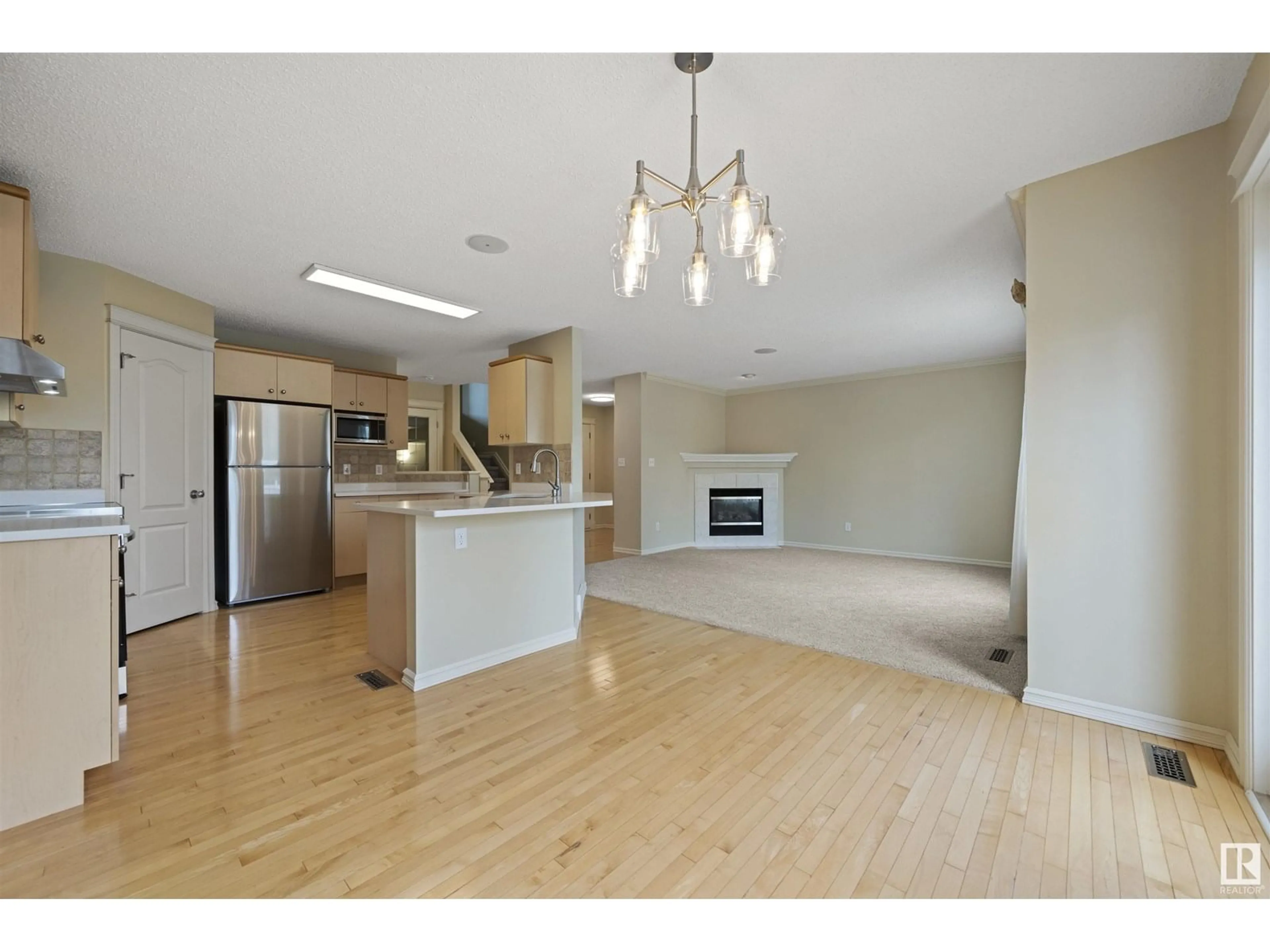 Open concept kitchen, wood/laminate floor for 634 GLENWRIGHT CR, Edmonton Alberta T5T6K6