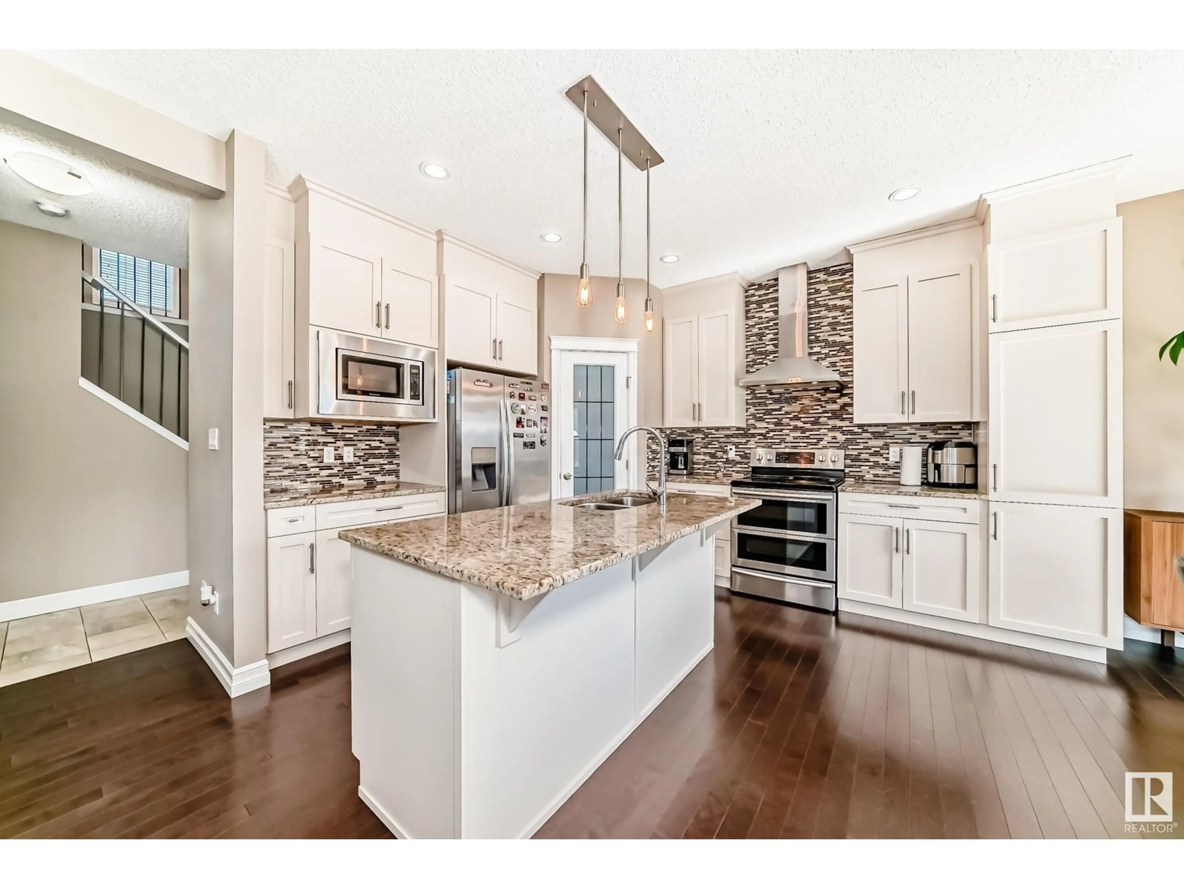Open concept kitchen, ceramic/tile floor for NW - 16311 135 ST, Edmonton Alberta T6V0J9