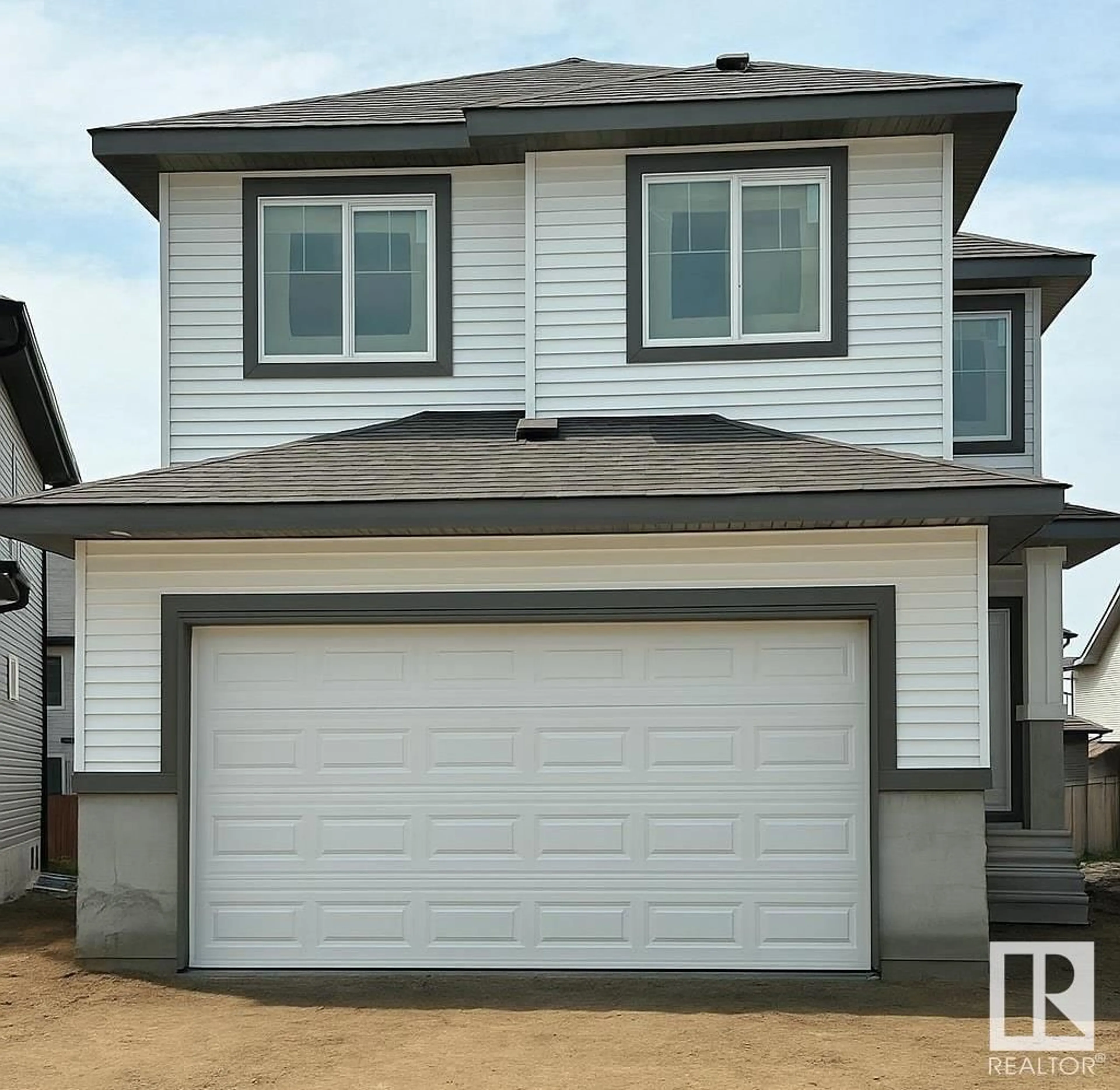 Home with vinyl exterior material, street for 10 SERENO LN, Fort Saskatchewan Alberta T8L0Z9