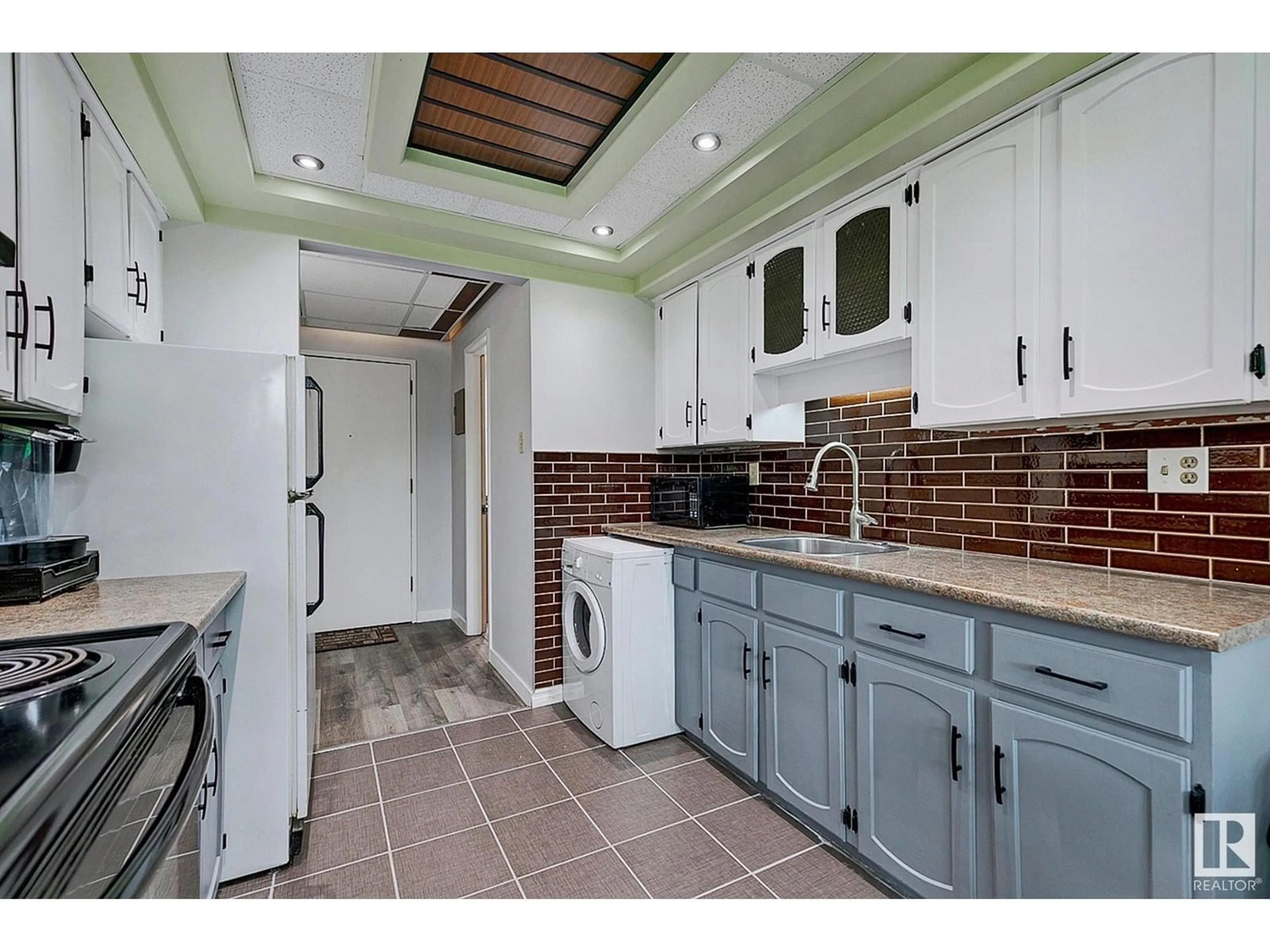 Open concept kitchen, ceramic/tile floor for #204 - 7825 159 ST, Edmonton Alberta T5R2E1