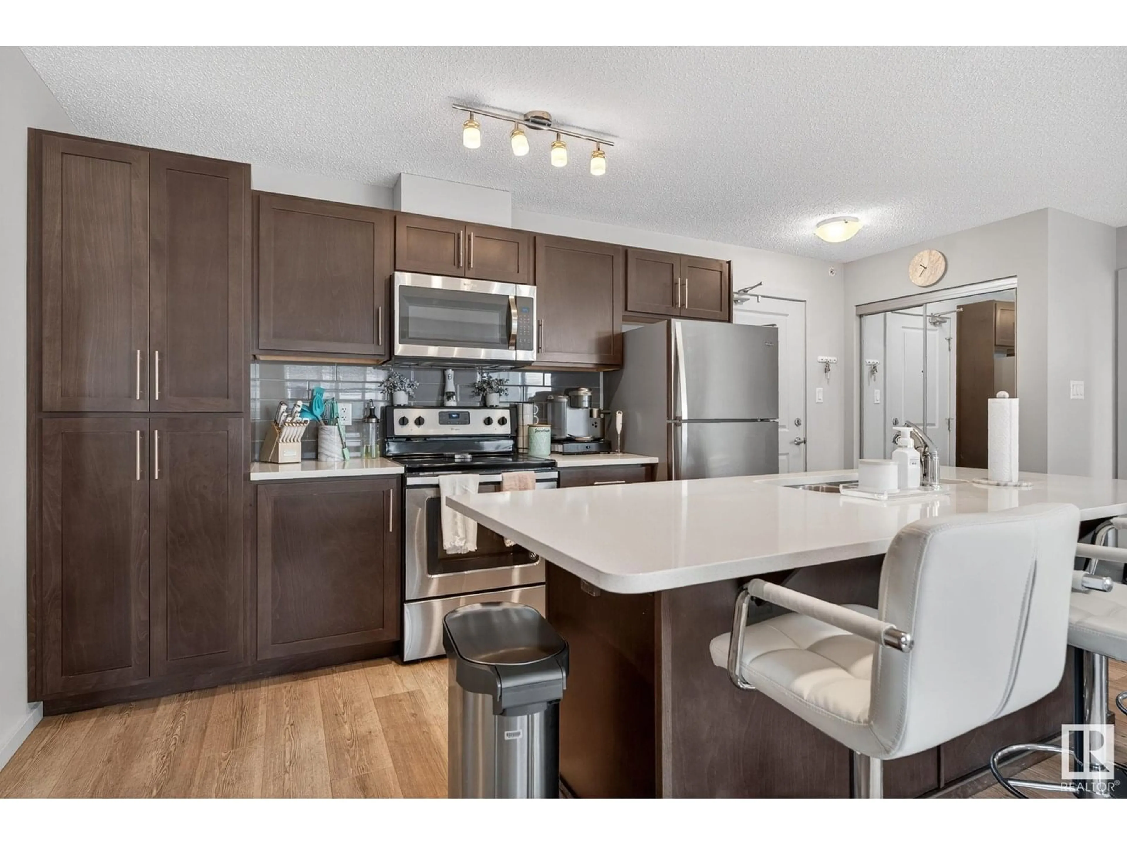 Open concept kitchen, unknown for #409 - 5404 7 AV SW, Edmonton Alberta T6X2K4