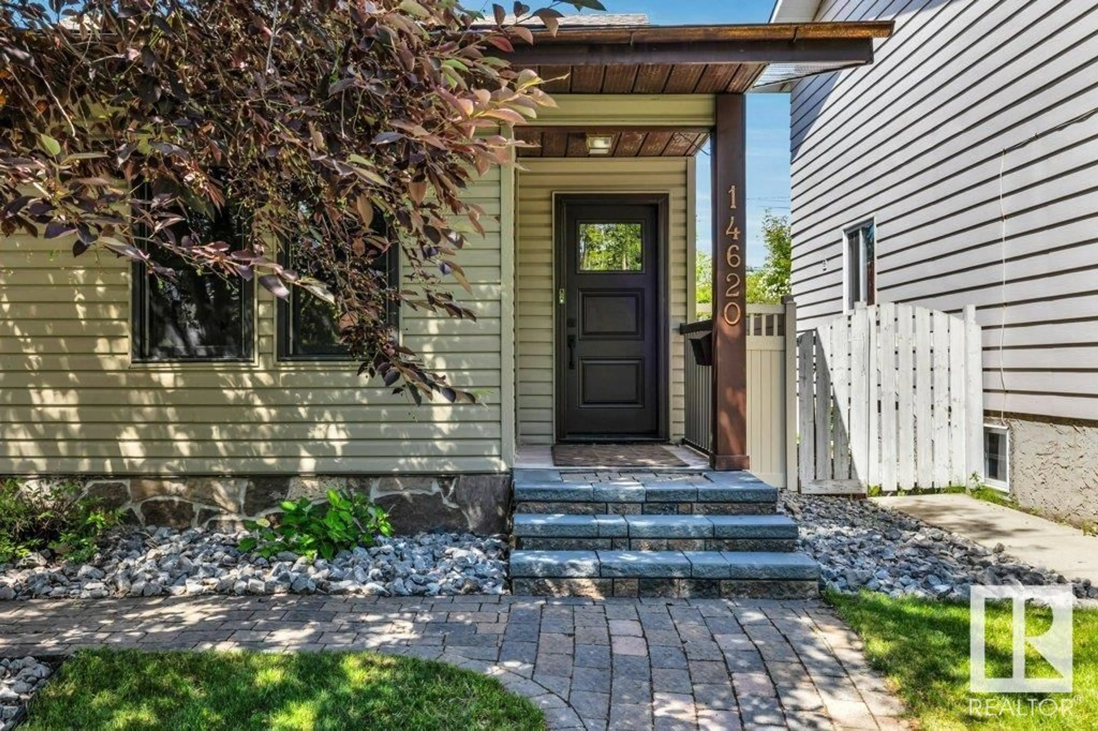 Home with brick exterior material, street for 14620 104 AV, Edmonton Alberta T5N0X4