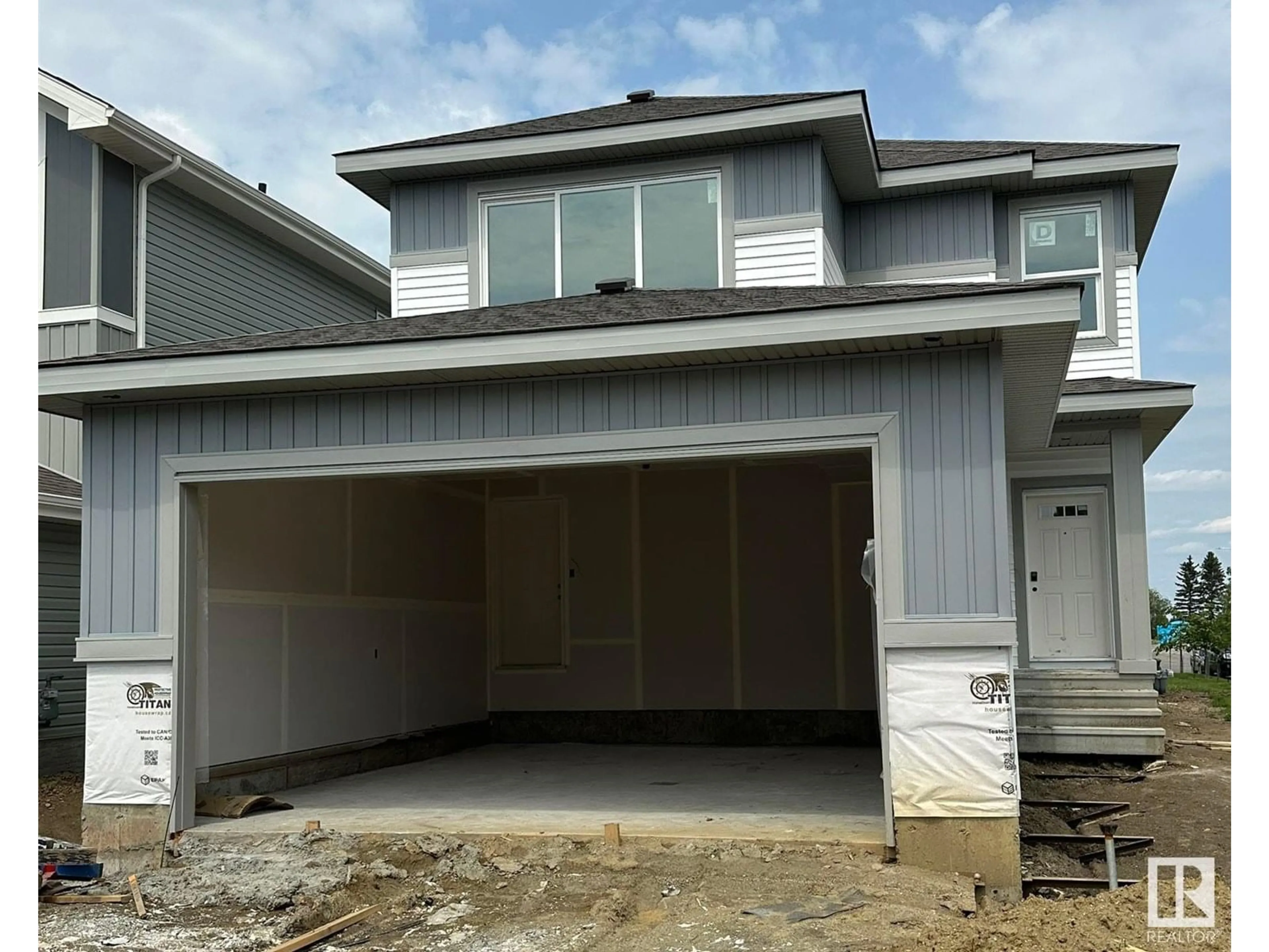 Home with vinyl exterior material, street for 50 SERENO LN, Fort Saskatchewan Alberta T8L0Z9