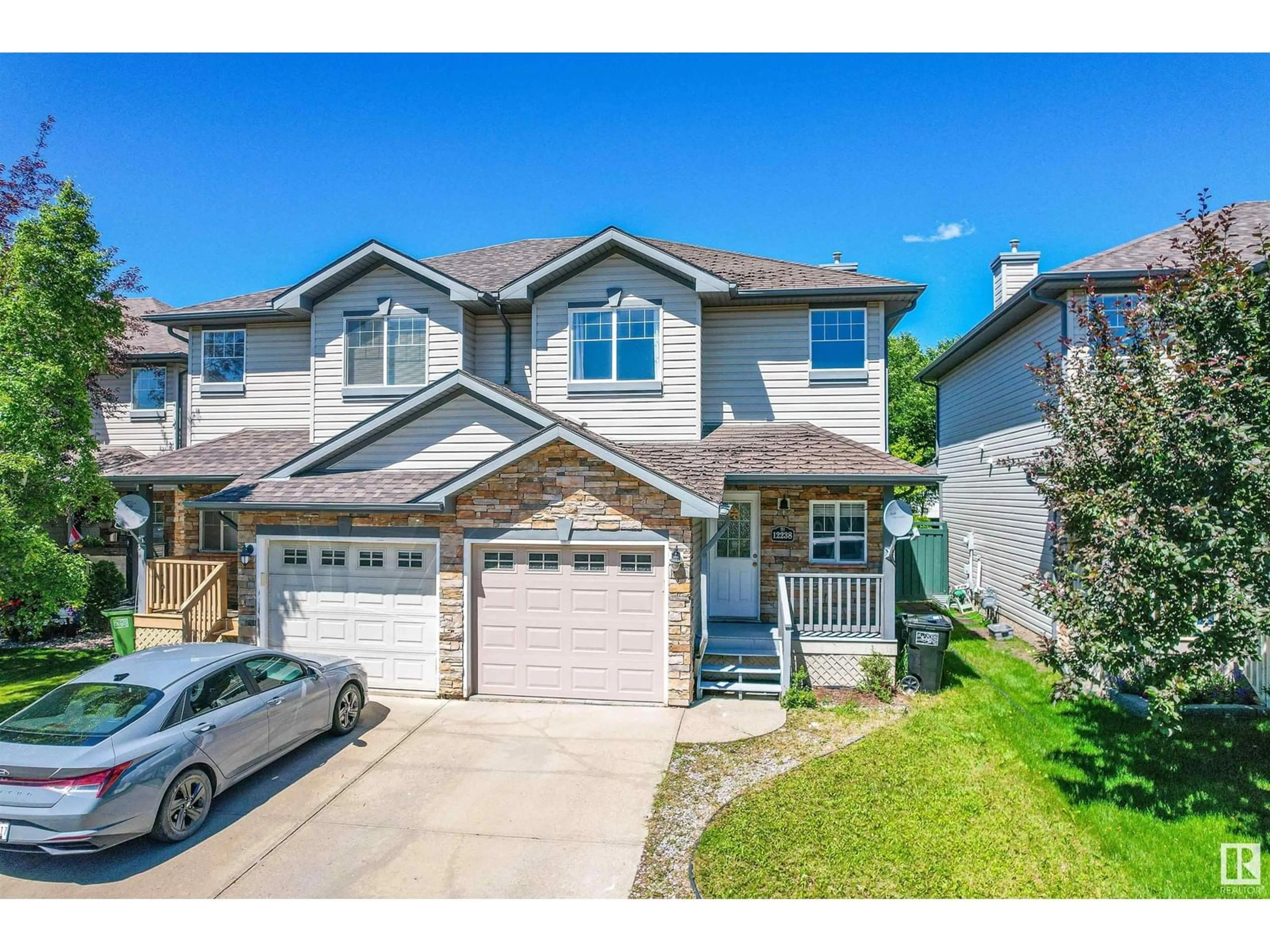 A pic from outside/outdoor area/front of a property/back of a property/a pic from drone, street for 12238 16 AV, Edmonton Alberta T6W1L7