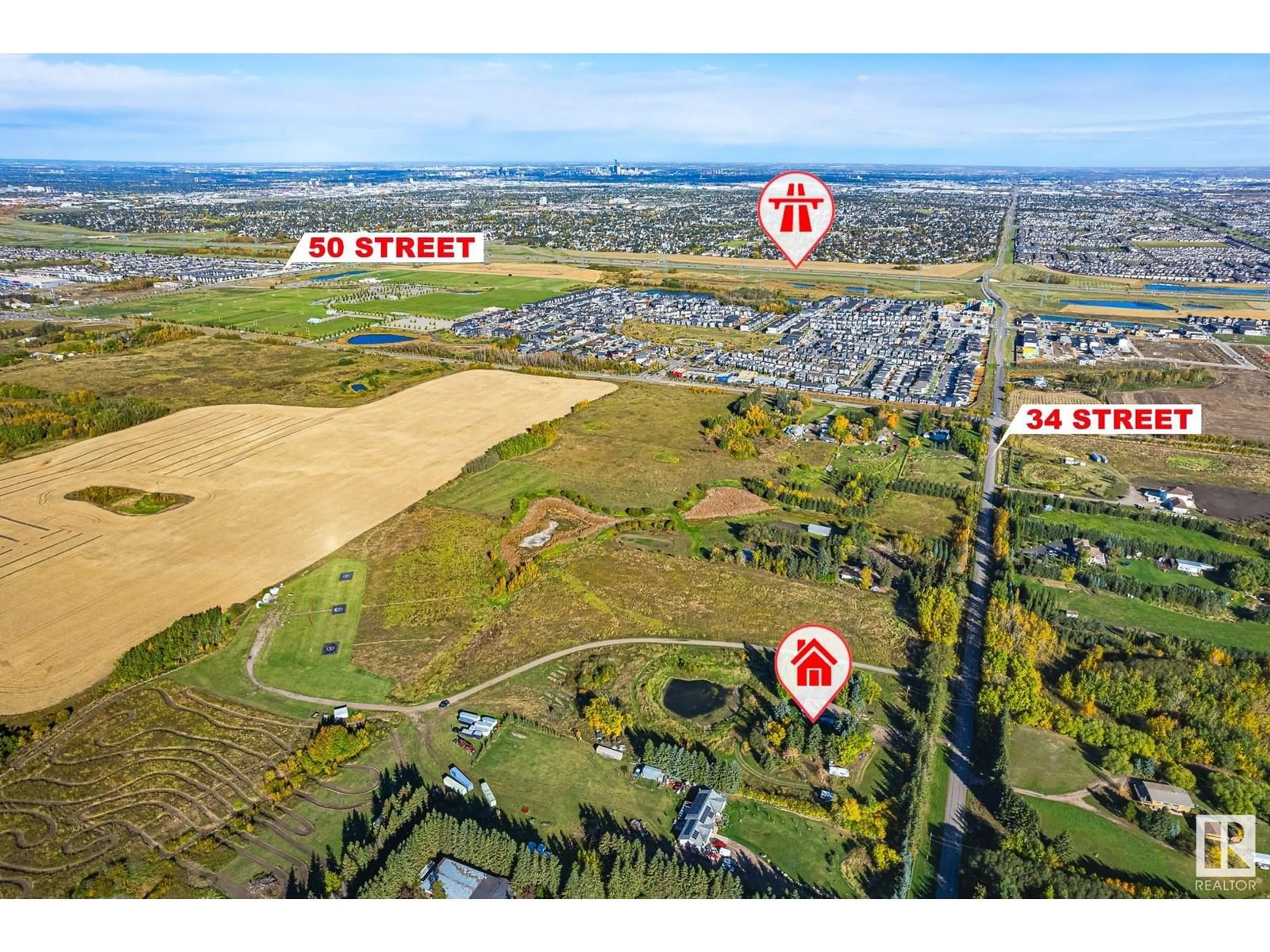 A pic from outside/outdoor area/front of a property/back of a property/a pic from drone, street for 1450 34 ST, Edmonton Alberta T6X1A5