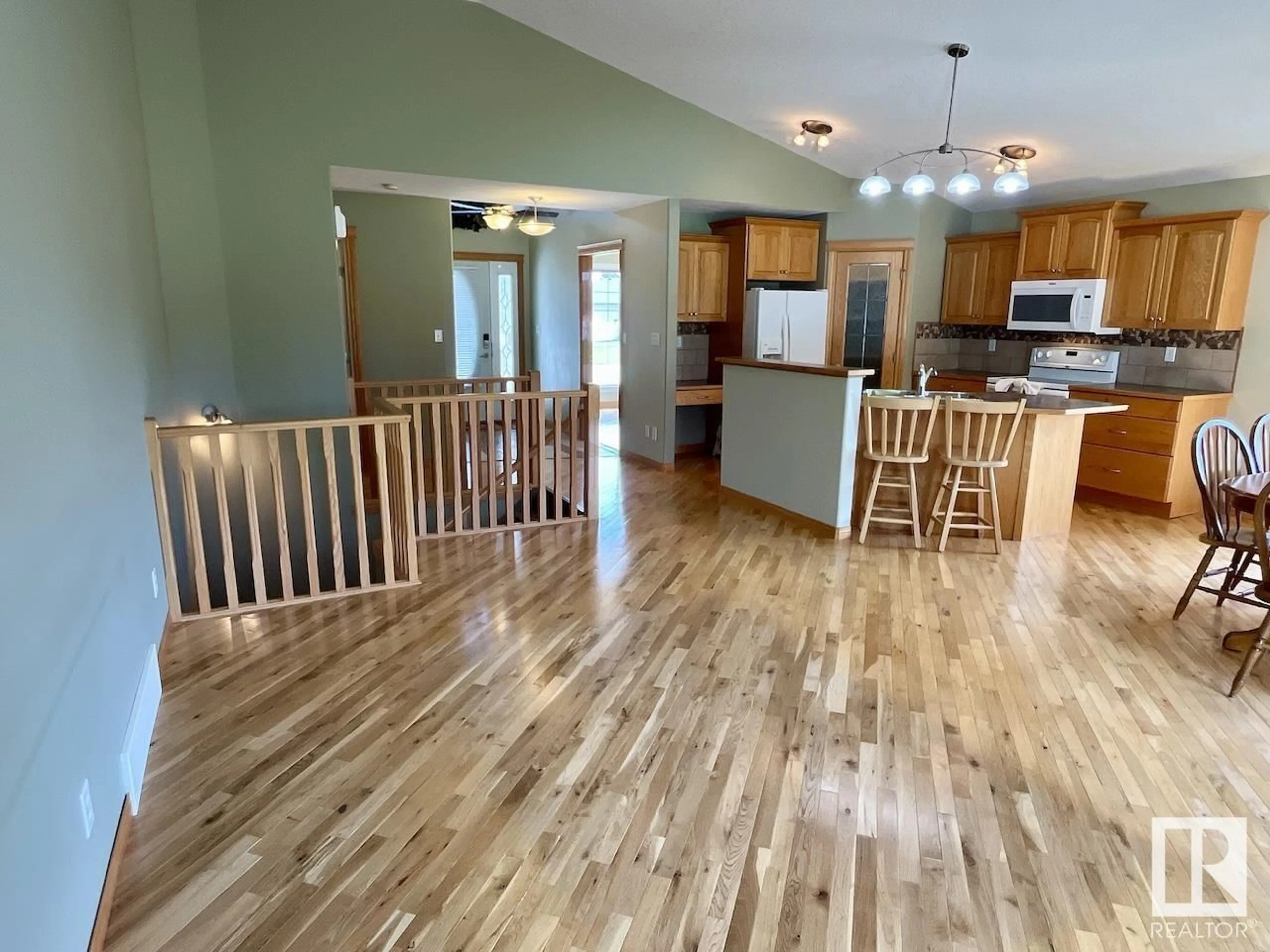 Open concept kitchen, wood/laminate floor for 121 NORTHBEND DR, Wetaskiwin Alberta T9A3L4