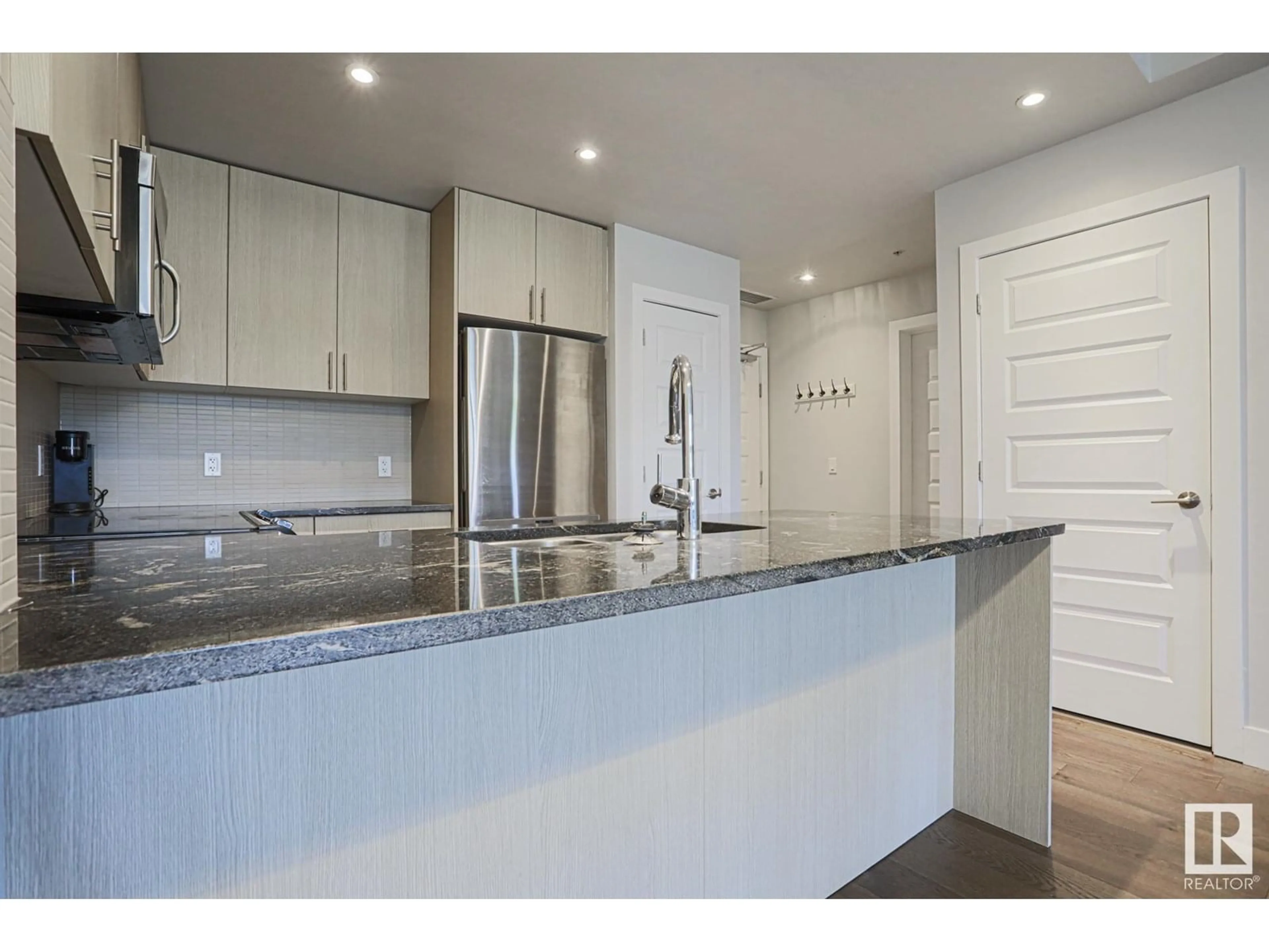 Open concept kitchen, unknown for #208 - 10140 150 ST, Edmonton Alberta T5P1P1