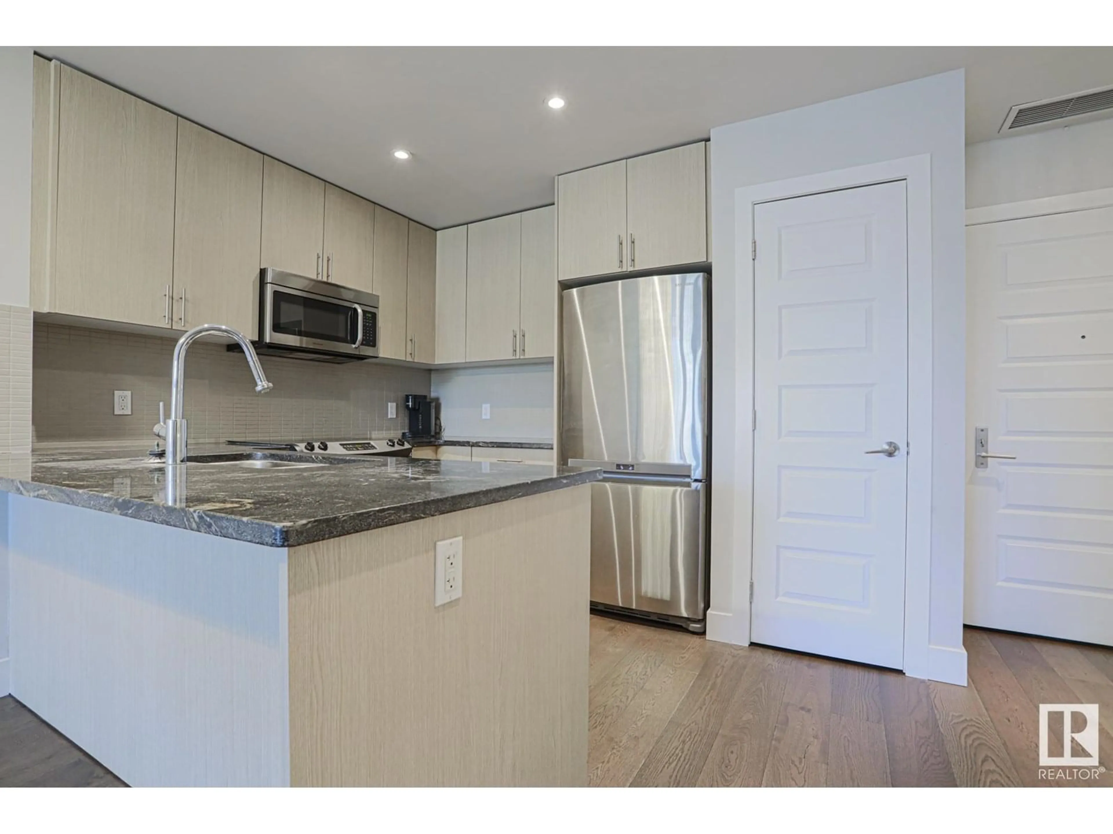 Standard kitchen, wood/laminate floor for #208 - 10140 150 ST, Edmonton Alberta T5P1P1