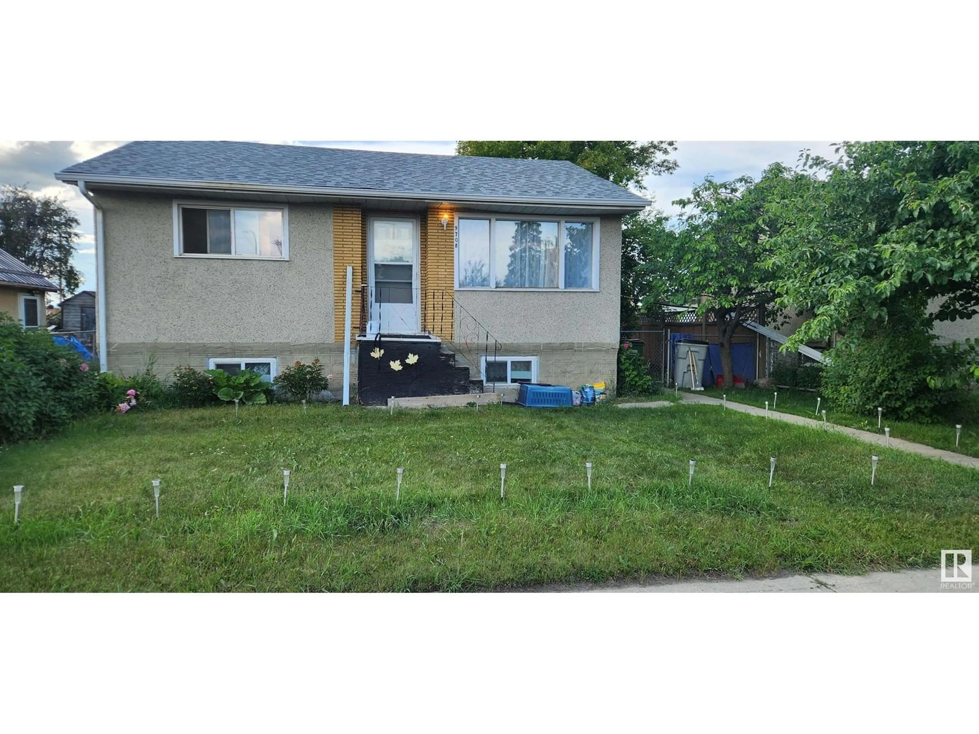 Home with vinyl exterior material, street for 9708 107 ST, Westlock Alberta T7P1R5