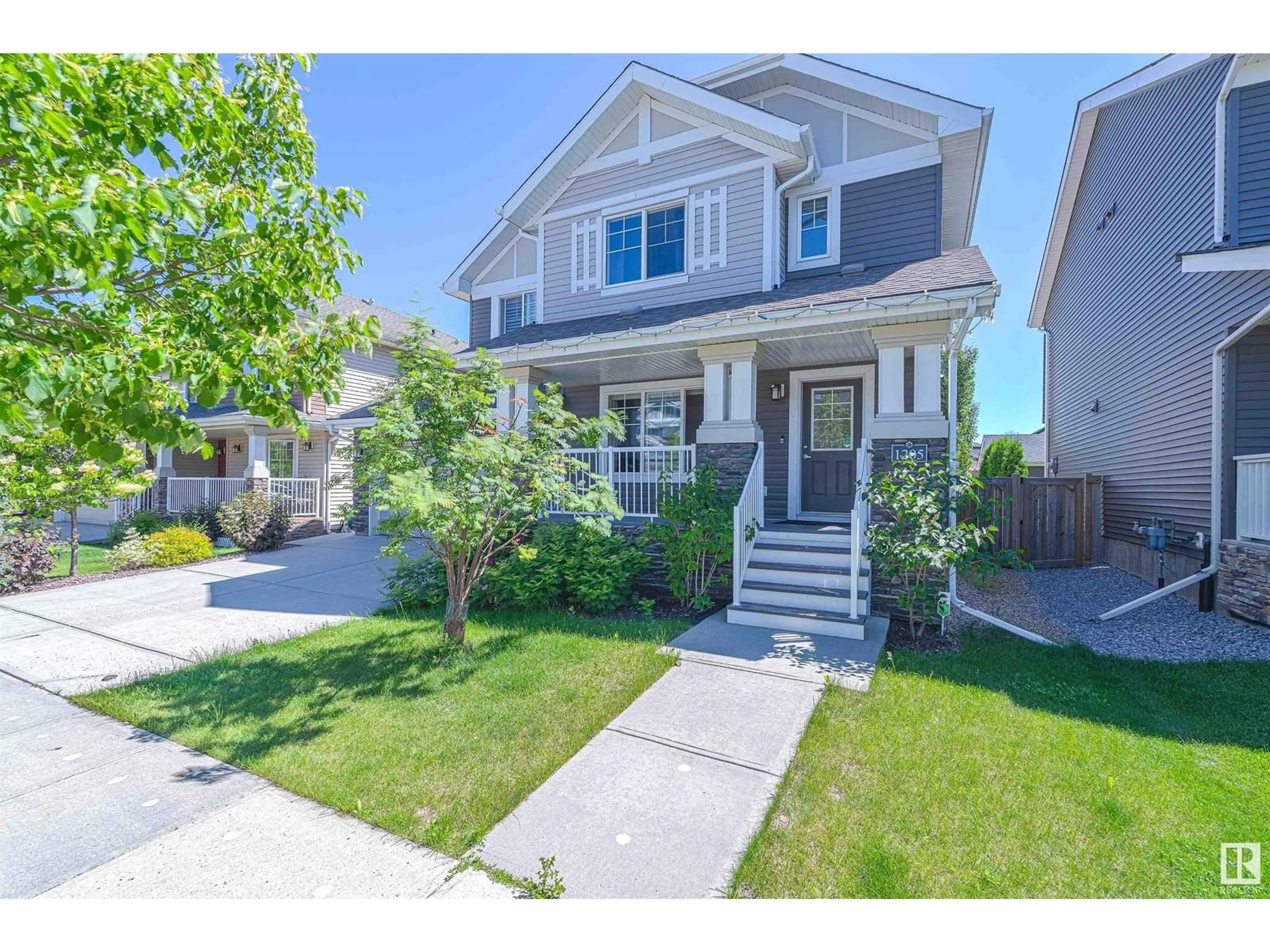 Home with vinyl exterior material, street for SW - 1205 162 ST, Edmonton Alberta T6W2L1