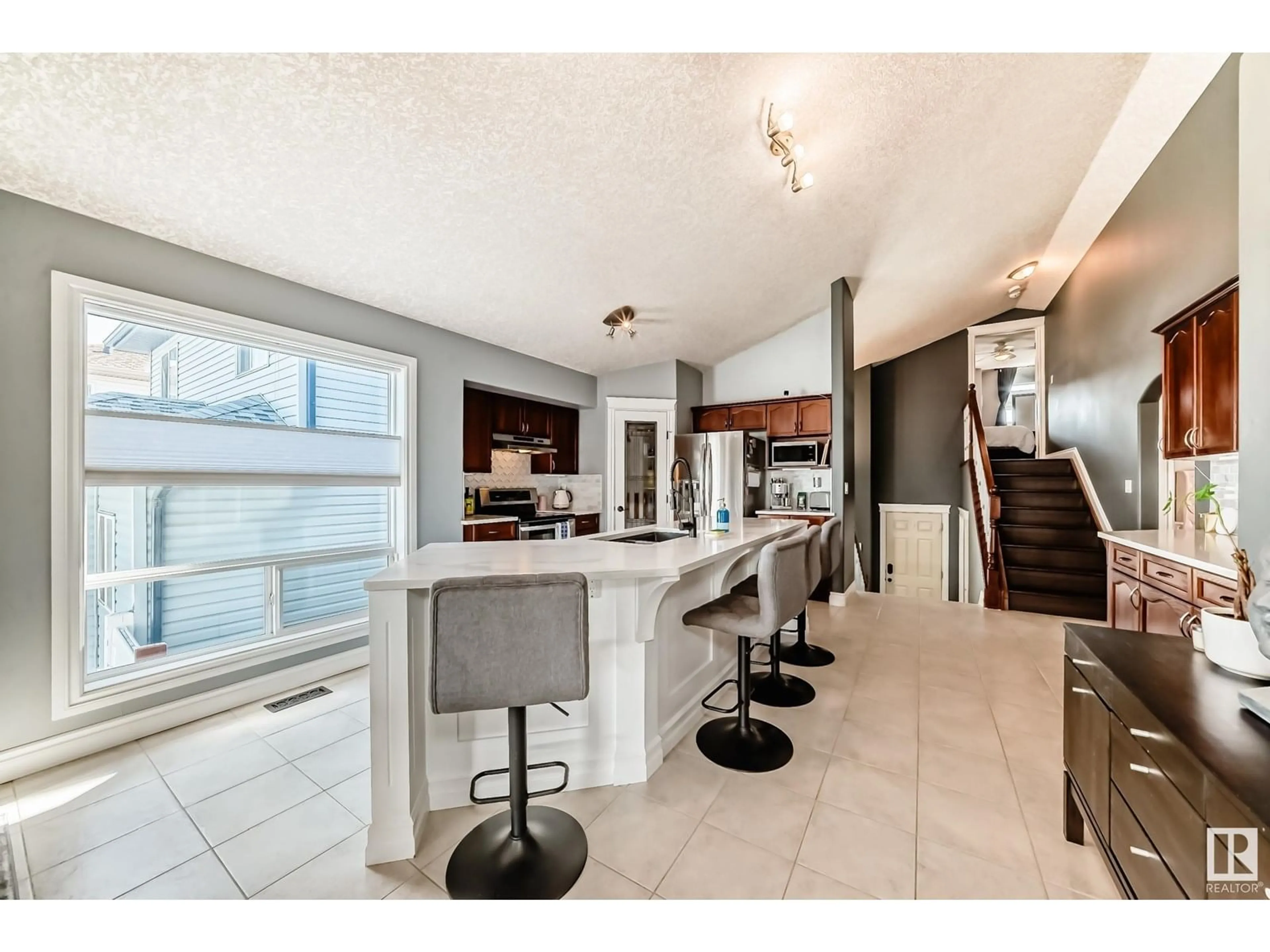 Open concept kitchen, ceramic/tile floor for 4708 164 AV, Edmonton Alberta T5Y0A5